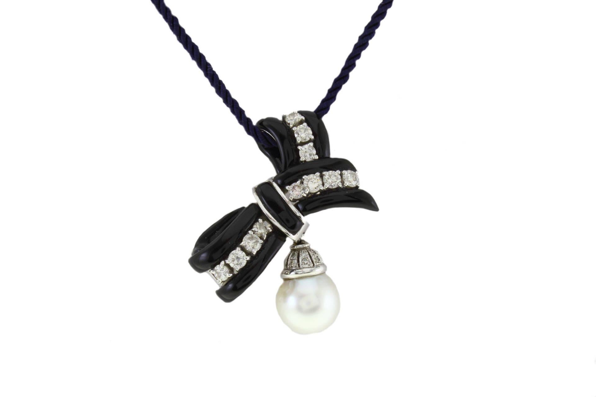 Brilliant Cut South-Sea Pearl, Onyx, Diamonds, 14 Karat White Gold Ribbon Brooch. For Sale