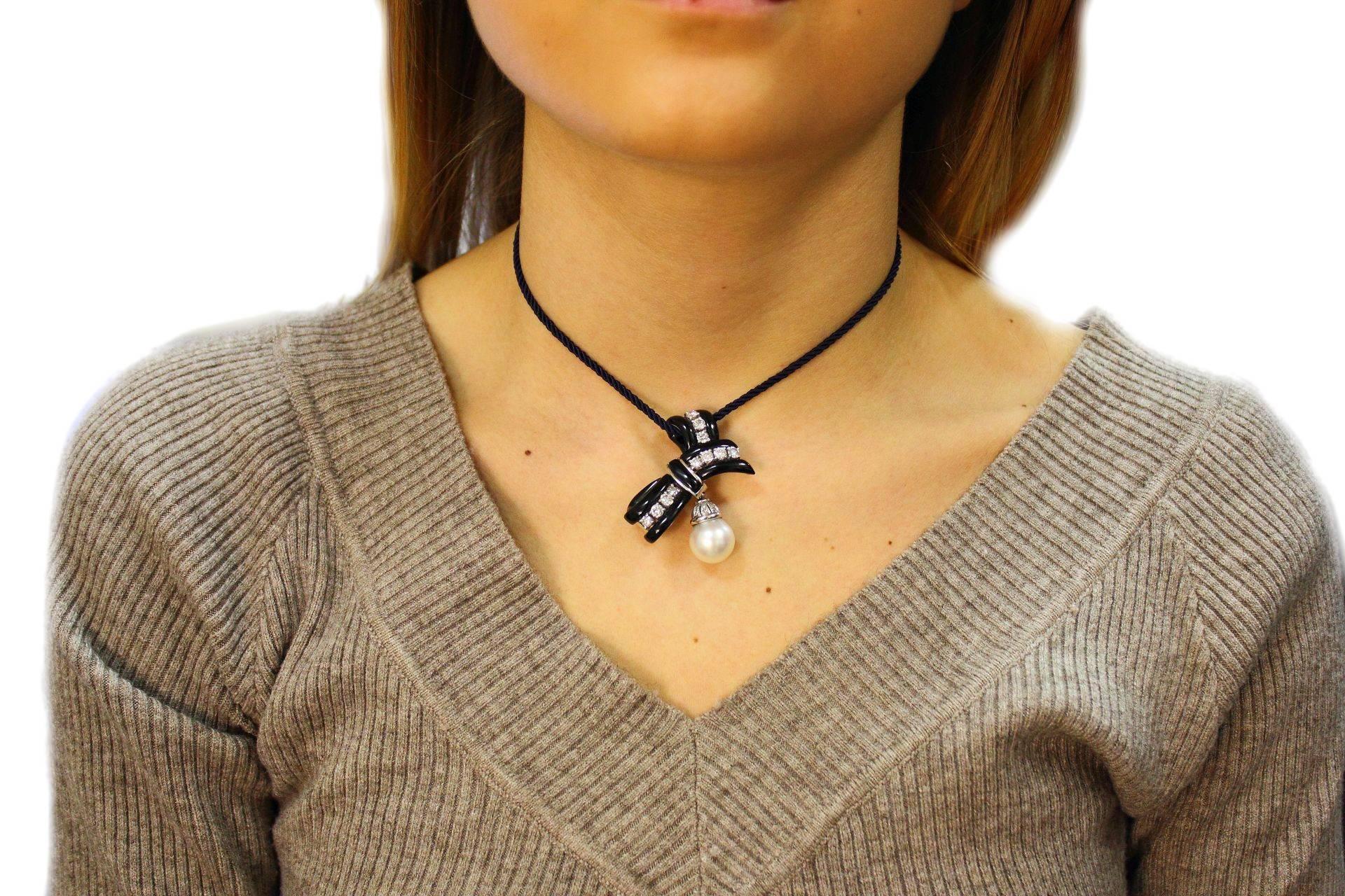 South-Sea Pearl, Onyx, Diamonds, 14 Karat White Gold Ribbon Brooch. For Sale 2