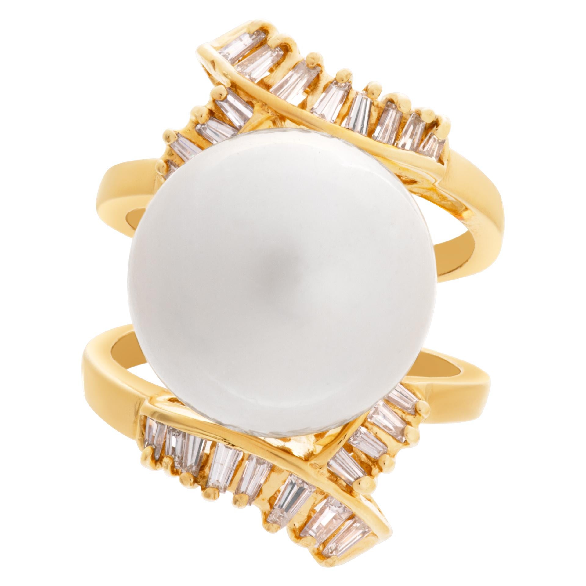 South Sea Pearl ring in 18k with approximately 0.30 carats in G-H color, VS-SI clarity diamond accents. Pearl is 14.5mm with very clean surface and strong lacre, with silver body and gold overtone. Size 6.25  This Pearl/diamond ring is currently