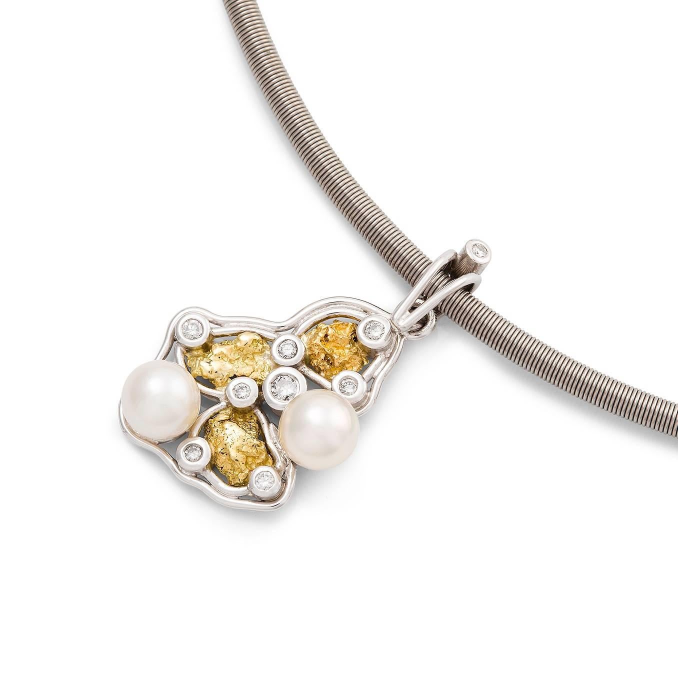 Pepita & Perla Neckpiece

This stunning hand crafted 18ct white gold pendant represents Western Australia's resource wealth. Set with Kalgoorlie nuggets, Argyle diamonds and Broome pearls and suspended from an elegant cable chain, this necklace is a