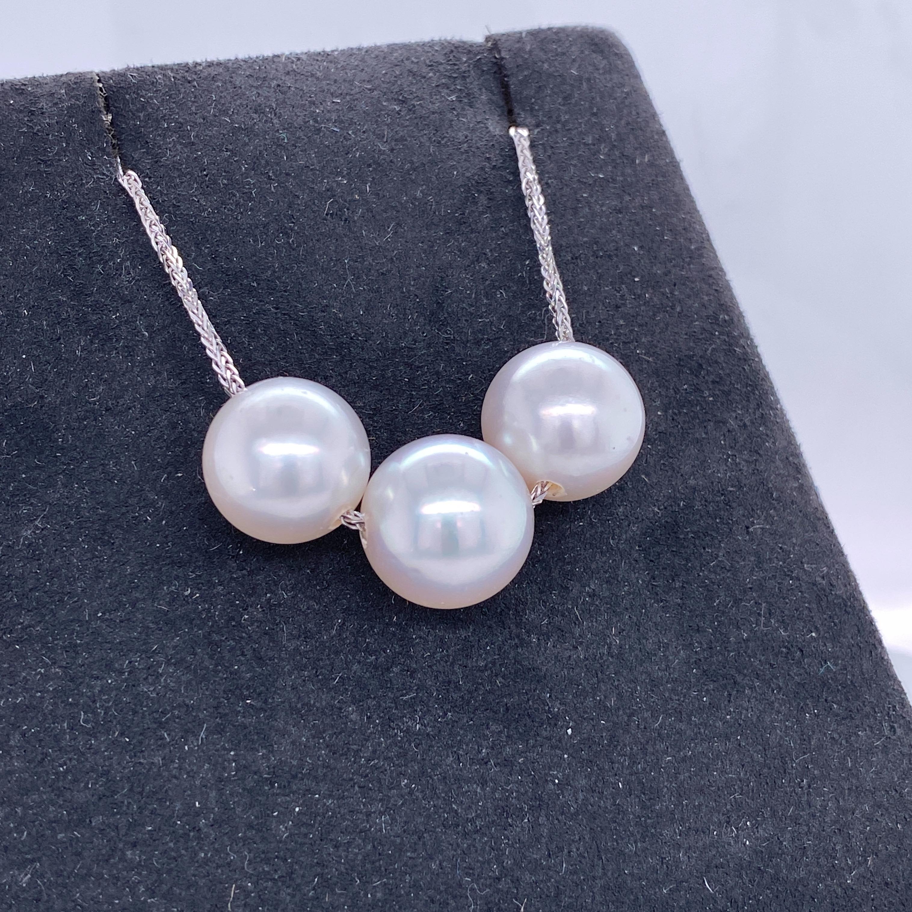 18K White gold slider necklace featuring three South Sea Pearls measuring 11-13 mm.
Great for stacking layers!

Pearls can be changed to Tahitian, Pink or Golden upon request. Price subject to change. 