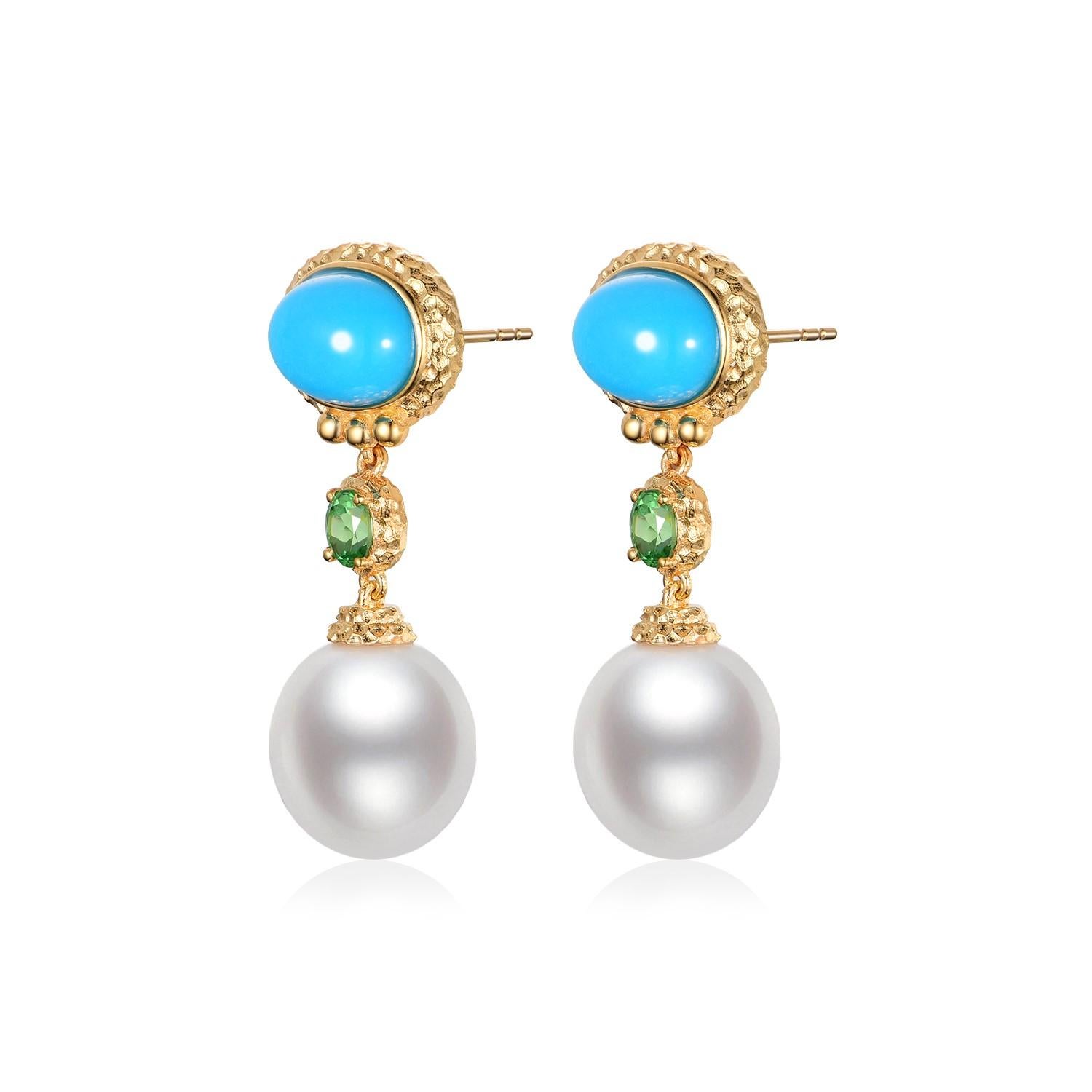 These drop earrings are a masterpiece of color and elegance, featuring an alluring combination of the ocean and earth's treasures set in the warm glow of 18K gold vermeil over sterling silver. At the heart of each earring is a lustrous 11mm South