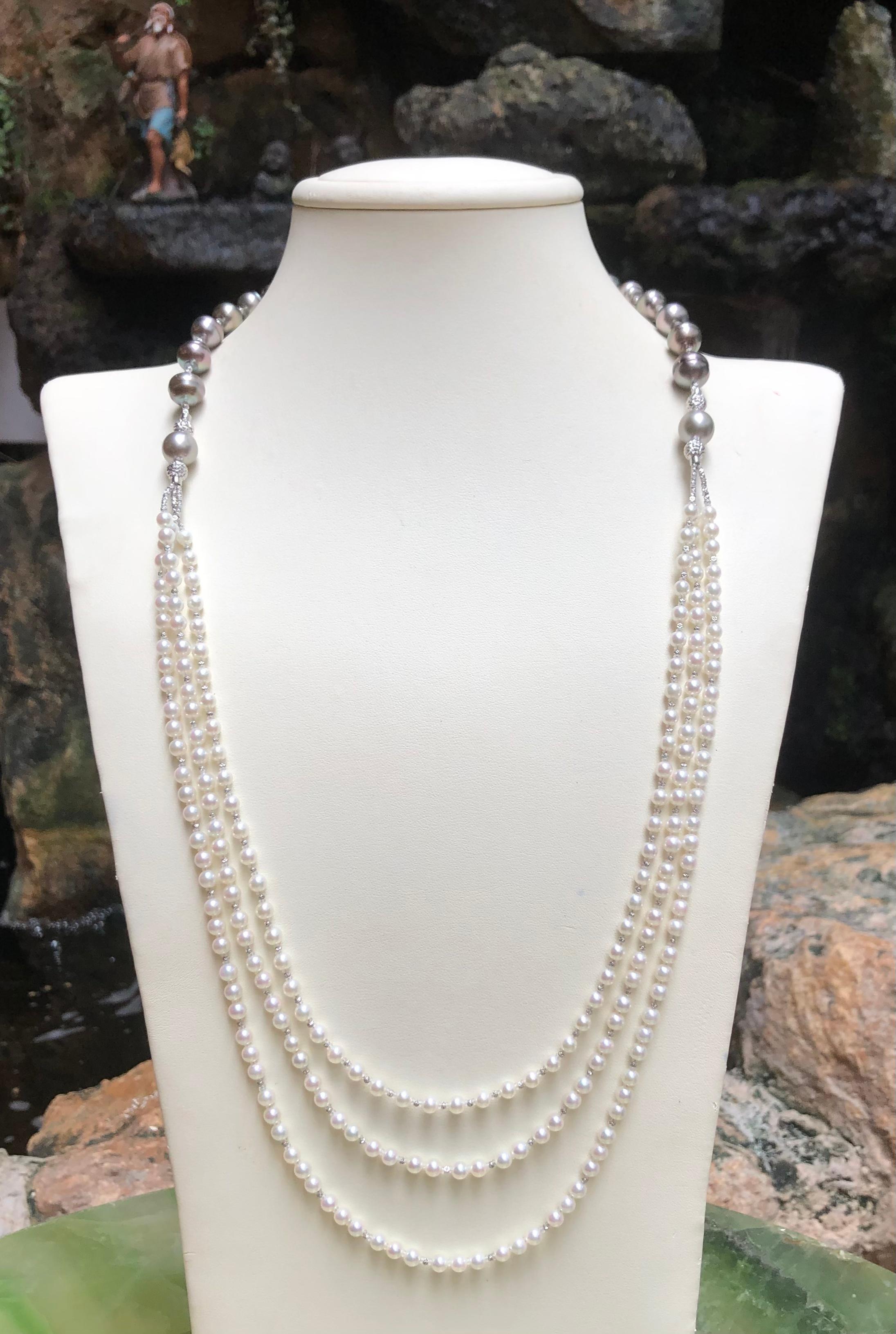 Collier de perles des mers du Sud et perles d'Akoya serties dans de l'or blanc 18 carats

Largeur : 1,0 cm 
Longueur : 82.0 cm (32.5
