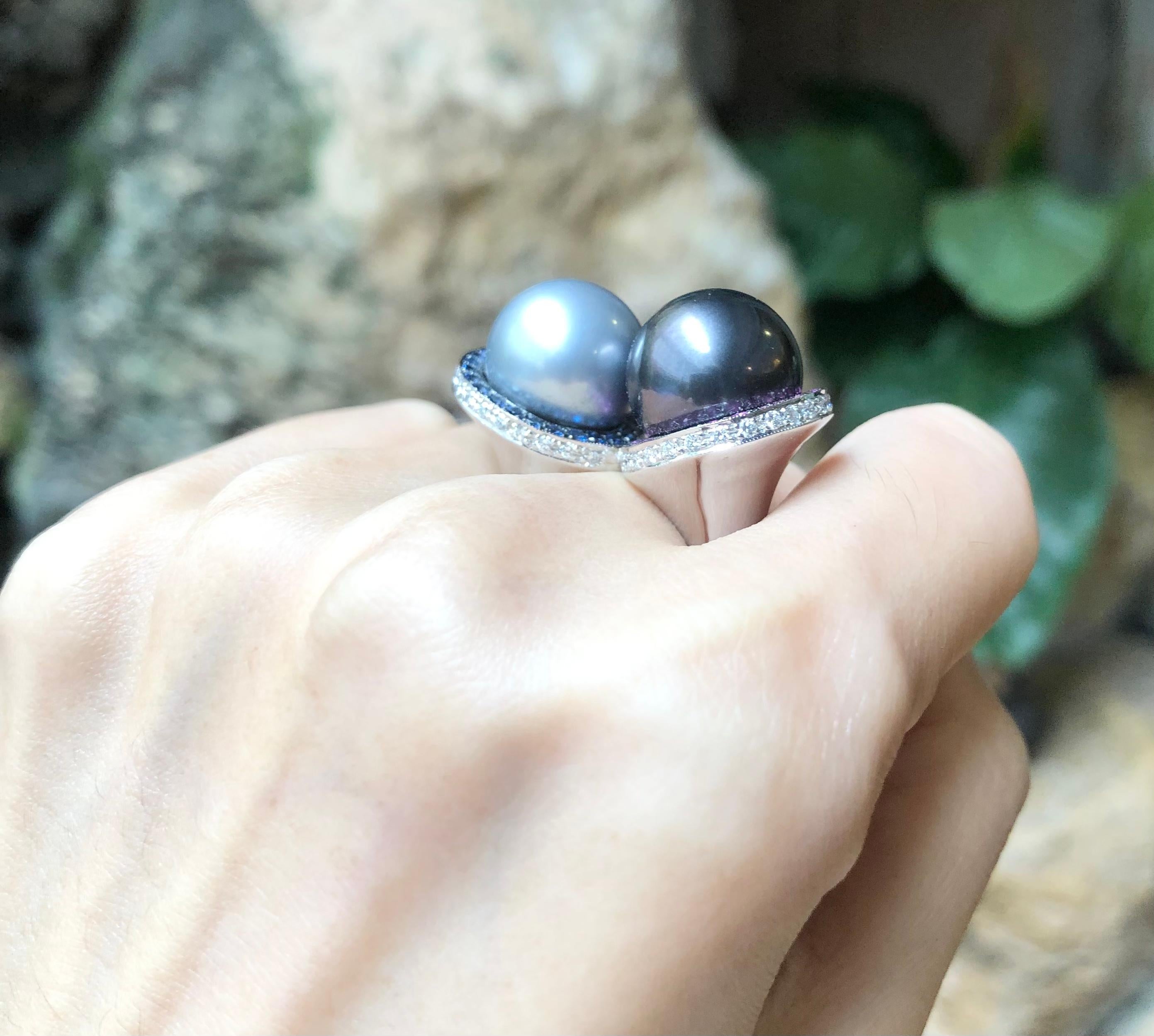 South Sea Pearl with Diamond 0.47 carat, Blue Sapphire 0.57 carat and Pink Sapphire 0.59 carat Ring set in 18 Karat White Gold Settings

Width:  3.5 cm 
Length: 1.7 cm
Ring Size: 53
Total Weight: 23.8 grams

