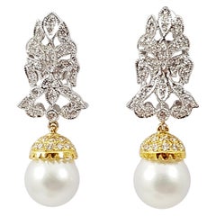 Boucles d'oreilles en or blanc 18 carats avec perles des mers du Sud, diamants et diamants bruns