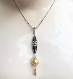 South Sea Pearl with Diamond and Onyx Pendant set in 18 Karat White Gold Setting