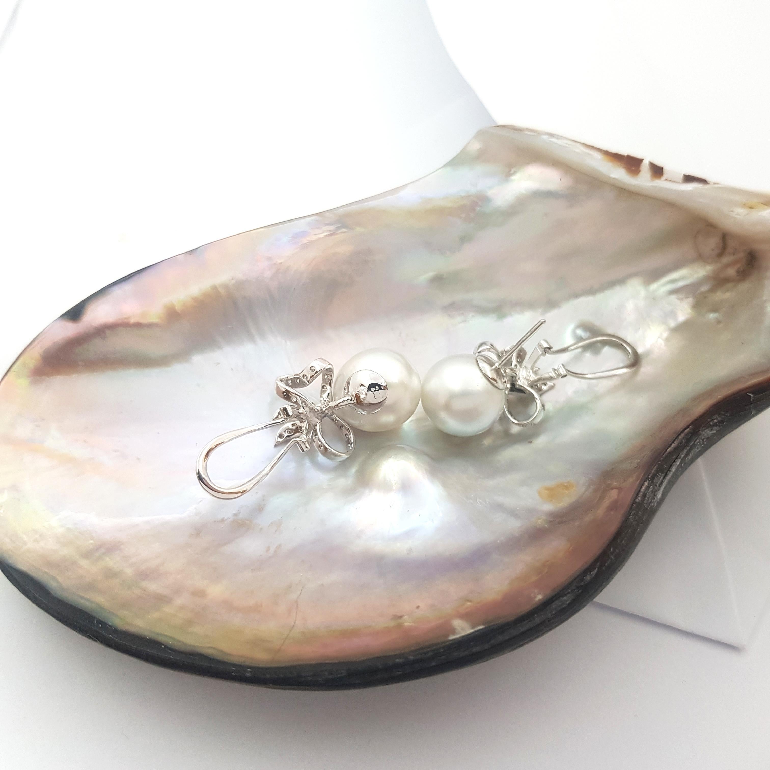 Contemporary South Sea Pearl with Diamond Bow Earrings set in 18K White Gold Settings