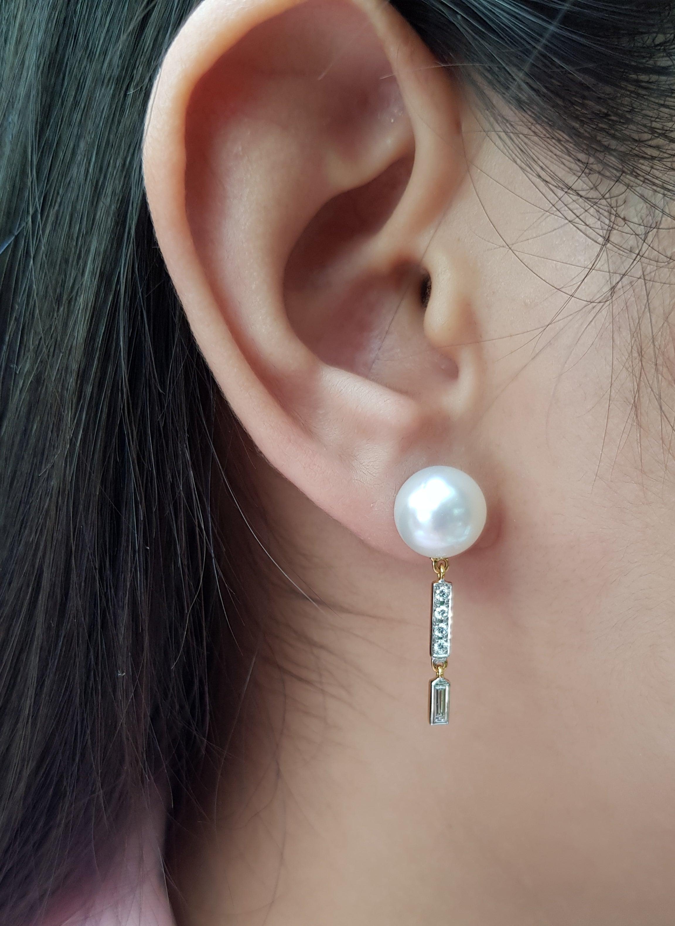 South Sea Pearl with Diamond 0.35 carats Earrings set in 18 Karat Gold Settings

Width: 1.0 cm
Length: 2.3 cm 

