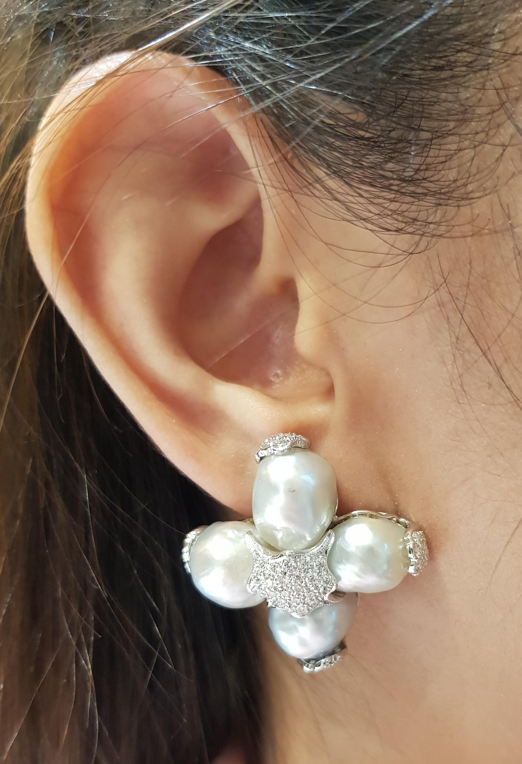 South Sea Pearl with Diamond 1.98 carats Earrings set in 18 Karat White Gold Settings

Width:  3.0 cm 
Length:  3.0 cm
Total Weight: 30.2 grams

