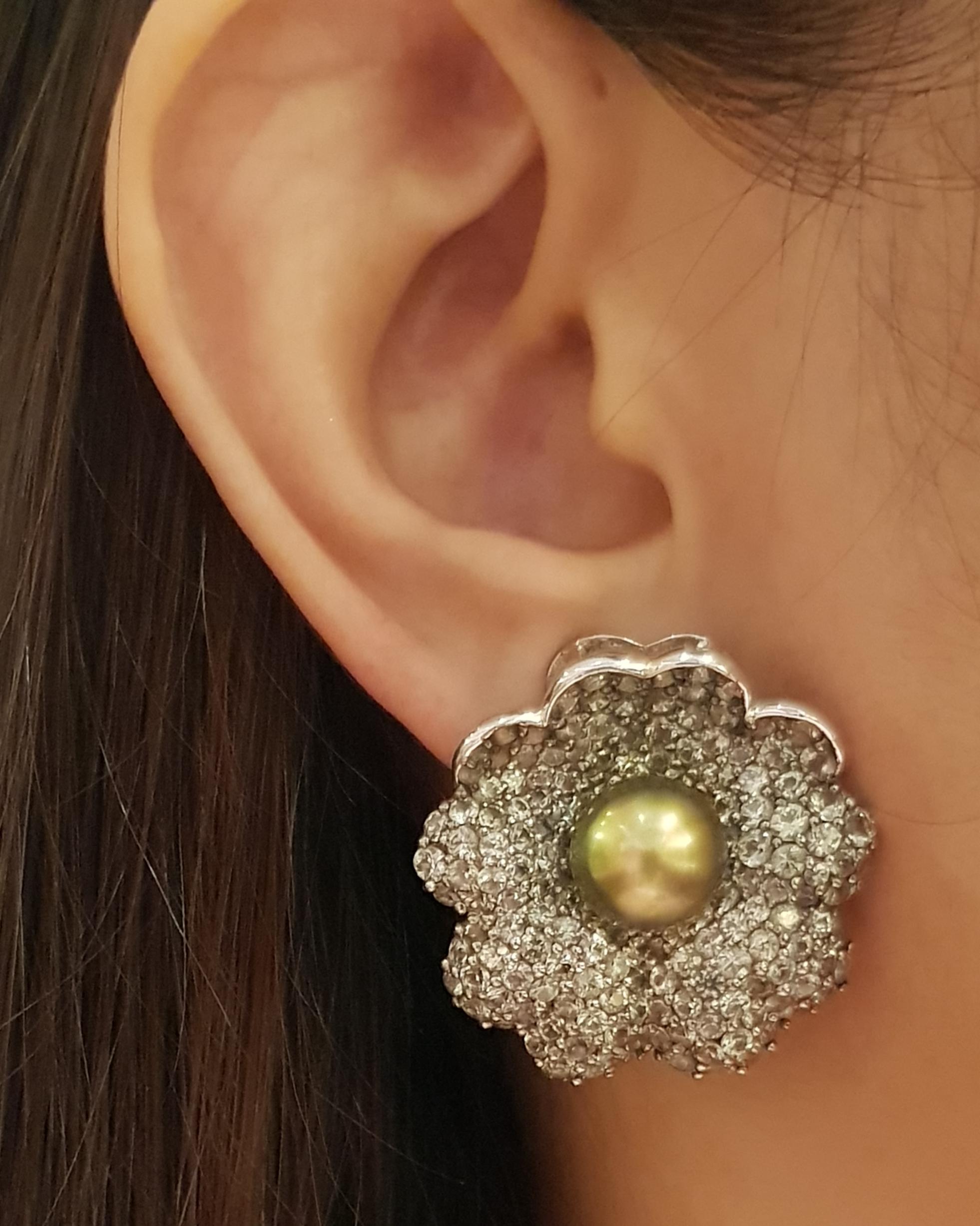 South Sea Pearl with Green Sapphire 1.99 carats Earrings set in 18 Karat White Gold Settings

Width:   3.0 cm 
Length:  3.5 cm
Total Weight: 38.49 grams

