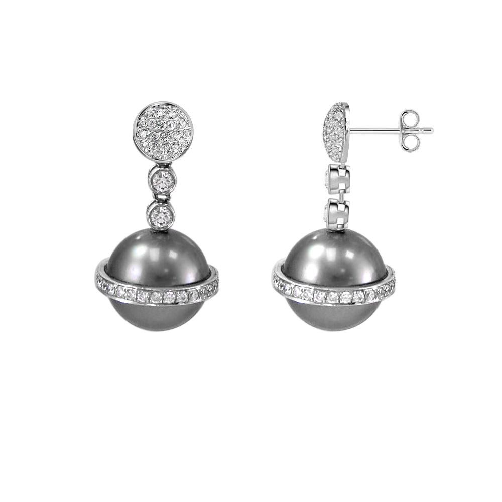 These elegant 18 karat white gold South Sea and diamond earrings are from Orostars' collection. Unique and charming design will catch eyes whenever you wear them.

Pearl Type: South Sea pearls
Pearl Origin: Australia
Pearl Size: 12mm
Metal: 18 Karat