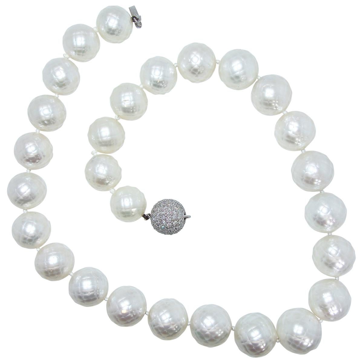 South Sea Pearls highly unusual faceted natural South Sea pearl strand, (accompanied by a certificate), 30 in count (two are included but not strung), these fine pearls display a deep nacre which makes each pearl luminous.  They range from 14 up to