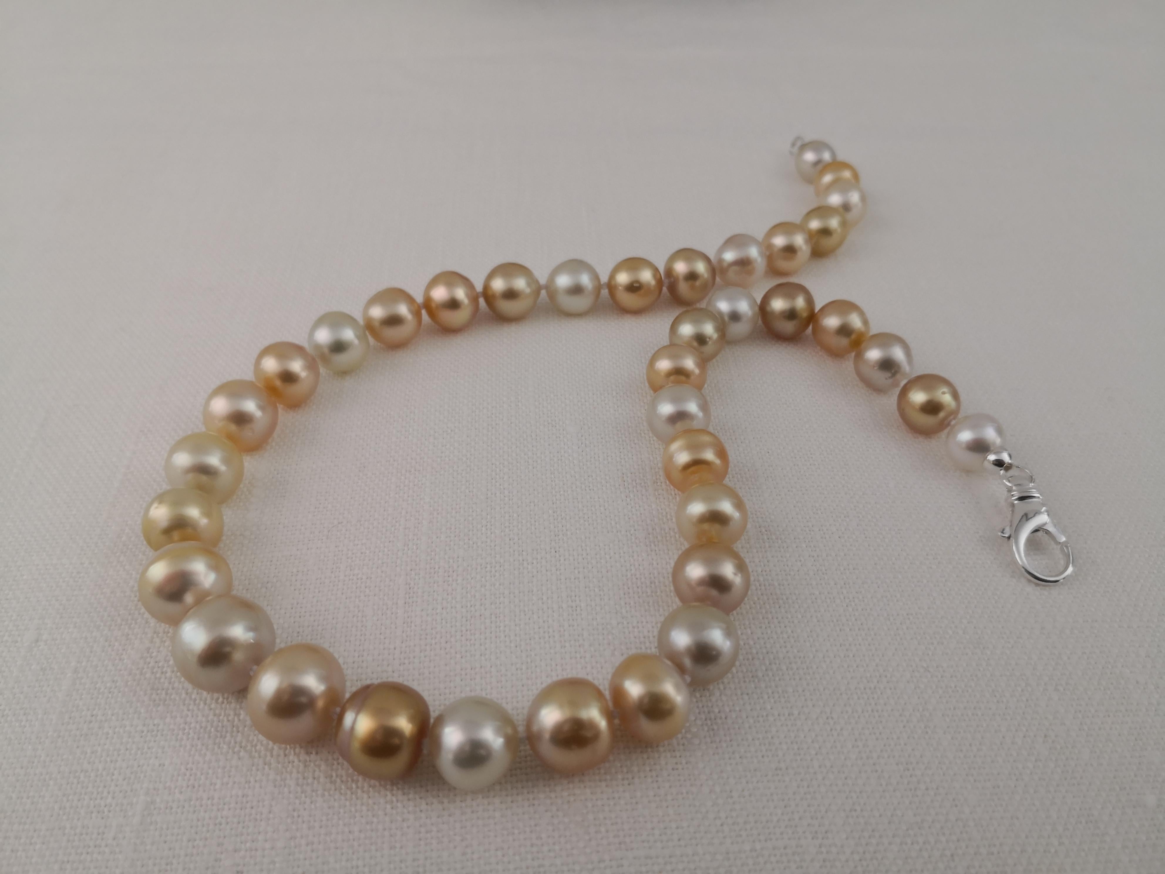 A Natural Color South Sea Pearls, from ocean waters.

- Size of Pearls 11-14 mm of diameter

- Pearls from Pinctada Maxima Oyster

- Origin: Indonesia ocean waters

- Natural multicolor White,  Cream, Golden, Champaign and mixed overtones

- High