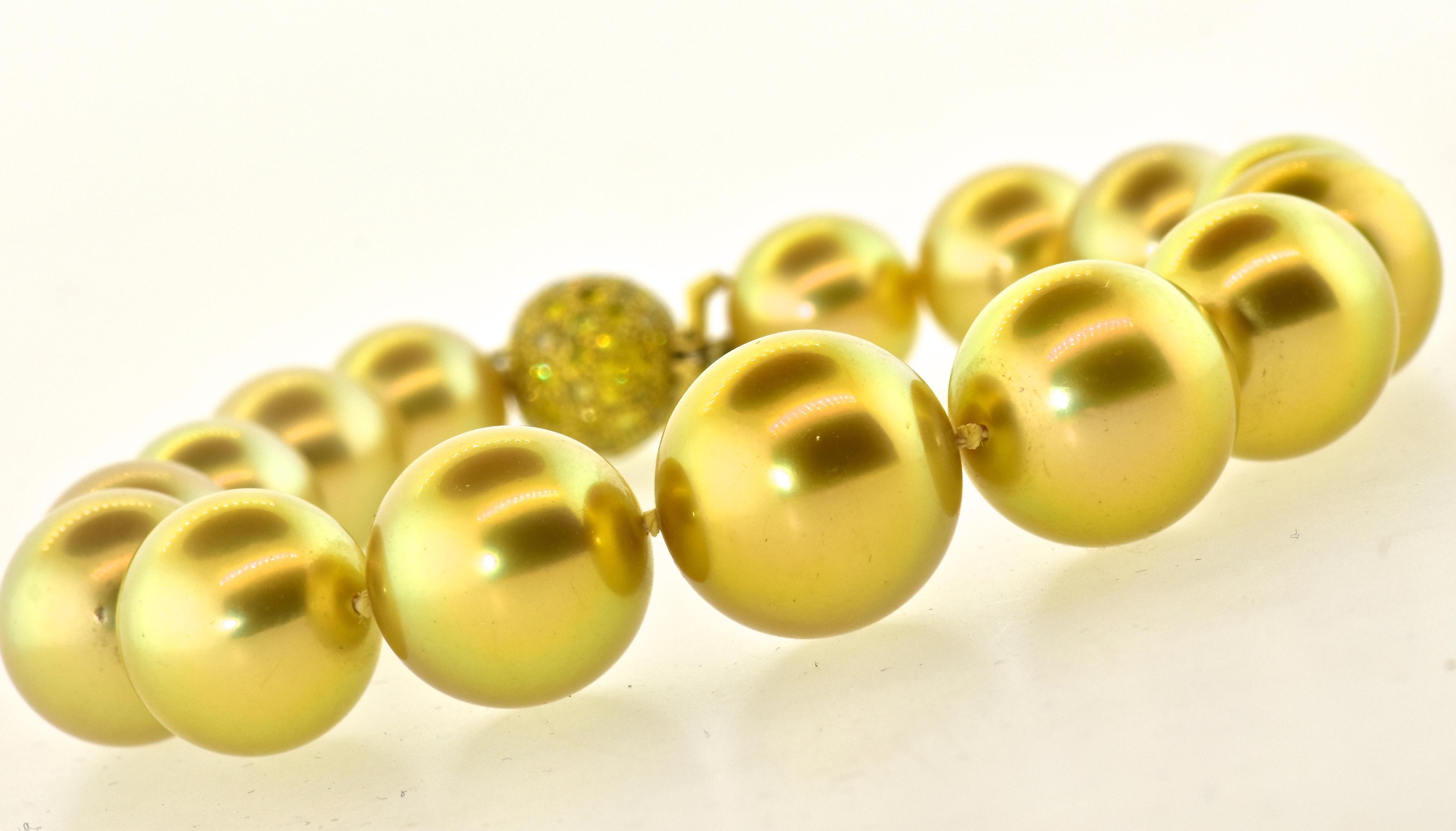 Natural South Sea golden color pearls, 15 true gem natural - not dyed - color, deep golden South Sea pearls slightly graduating in size, from 10.5 up to 14.35 mm.  The color is a vibrant deep gold color, the skins are very clean (no blemishes) with
