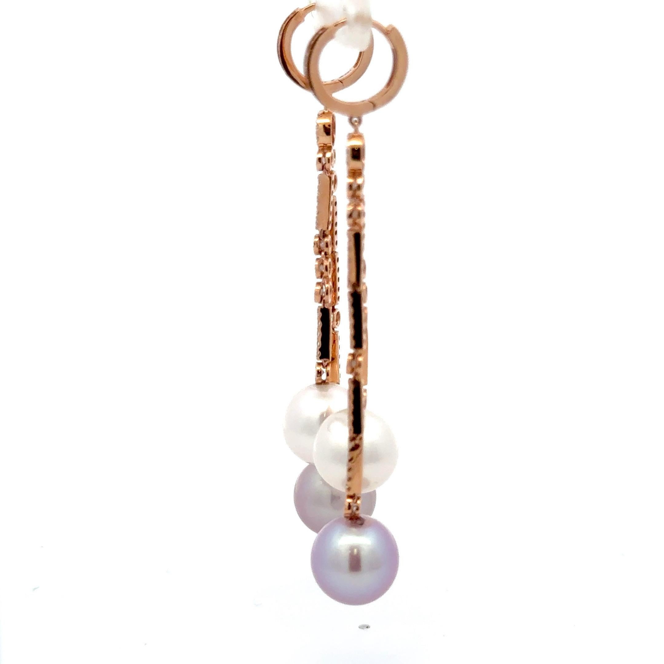 18 Karat Rose gold drop earrings featuring South Sea & Pink Freshwater Pearls measuring 10-11 MM with a diamond bar containing 114 round brilliants, 1.07 carats.

Available in white gold & yellow.
Pearls can be changed to different colors. 
