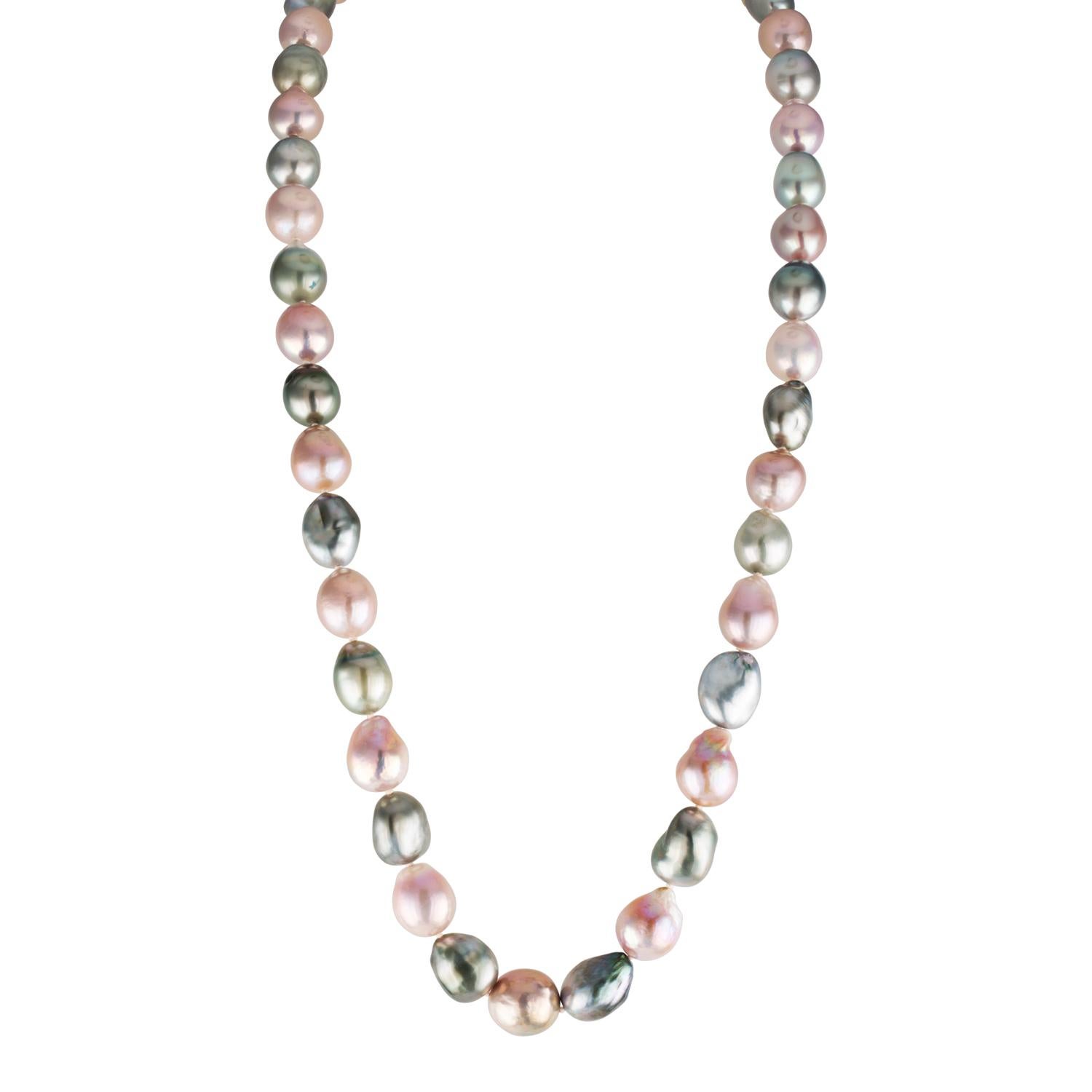 This double length necklace features alternating South Sea Tahitian and Chinese freshwater natural color pink baroque cultured pearls. This striking collection of pearls can rarely be found at such quality.
The pearls measure 14x16mm and are strung