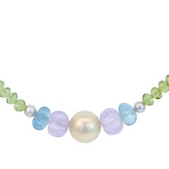 Collier en or des mers du Sud, perle de Tahiti, aigue-marine, quartz lavande et péridot
