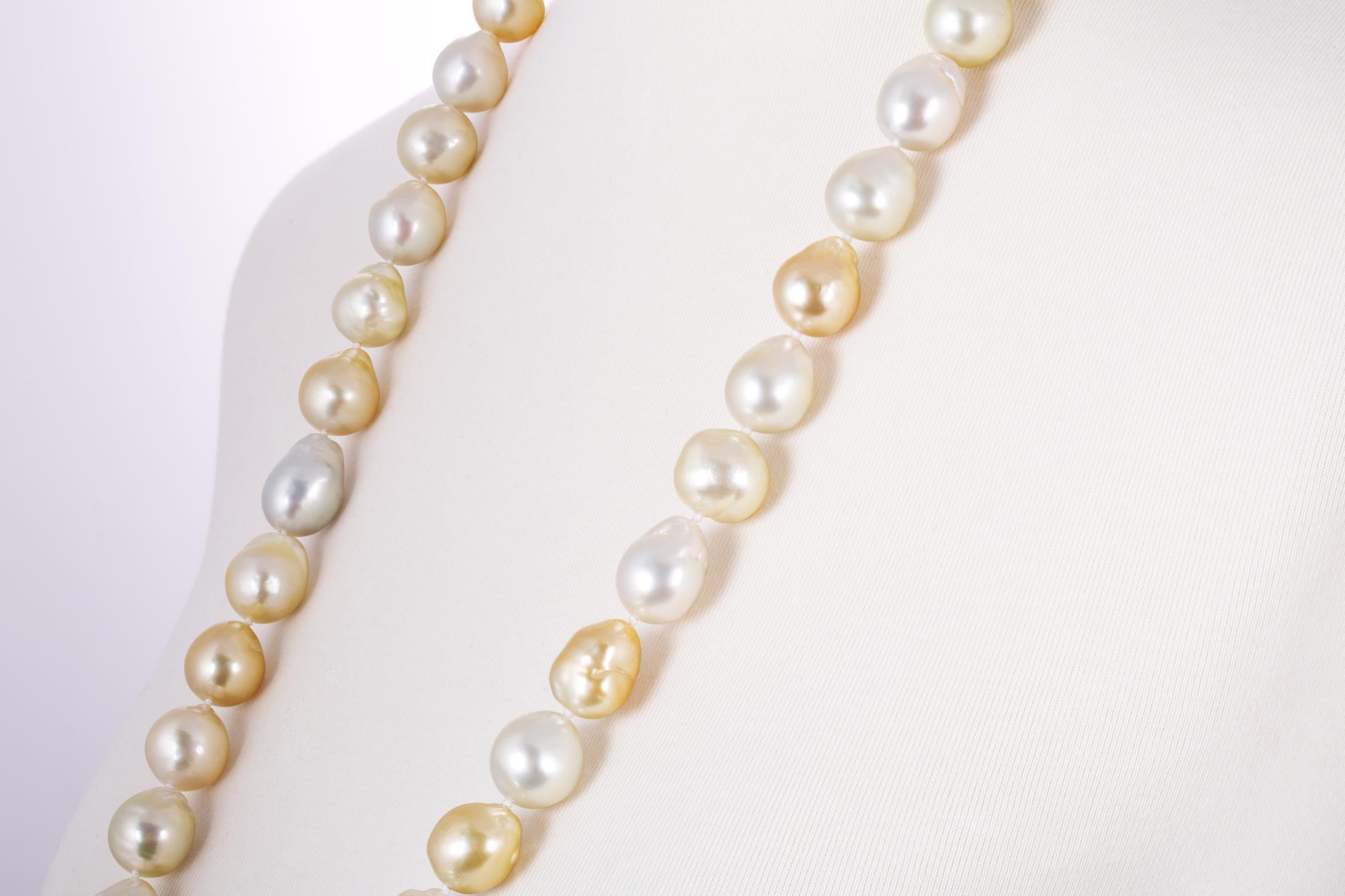 This cultured pearl rope necklace features South Sea White and South Sea Golden natural color, Baroque measuring 15x16.6mm. These pearls feature high luster and clean surface for a elegant look.
The pearls are strung knotted,endless for easy putting