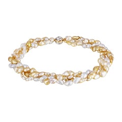 South Sea White and Golden Keshi Pearl Necklace with 14 Karat Gold Clasp