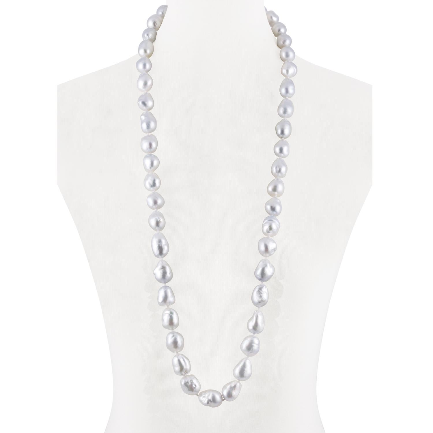 This double length necklace features fine quality South Sea white Baroque cultured pearls measuring 15.1x18mm.
These large, Australian pearls have high luster and are perfectly matched.   
Their organic, baroque shapes are interesting yet