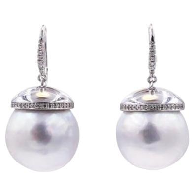 Silvery Blue Hues with Cold Tones
AA Baroque South Sea White Pearls
19MM Length
16MM Width 
0.13 cts Diamonds
14K White Gold
Fish Hook Earrings