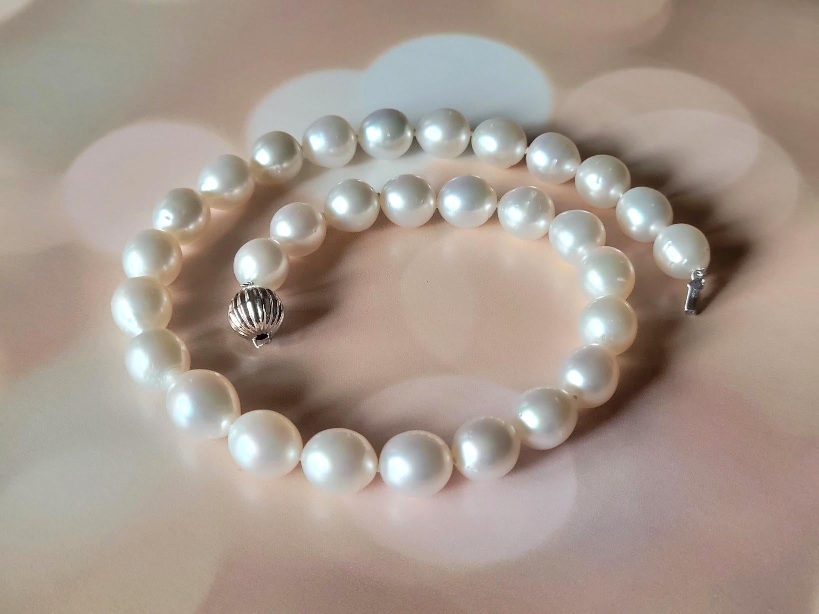 This exquisite necklace is made up of carefully selected white saltwater pearls of a rare pear shape. Each pearl, ranging in size from 13mm to 15.2mm, has a magnificent mother-of-pearl luster and a naturally elegant finish.

The pearls in this