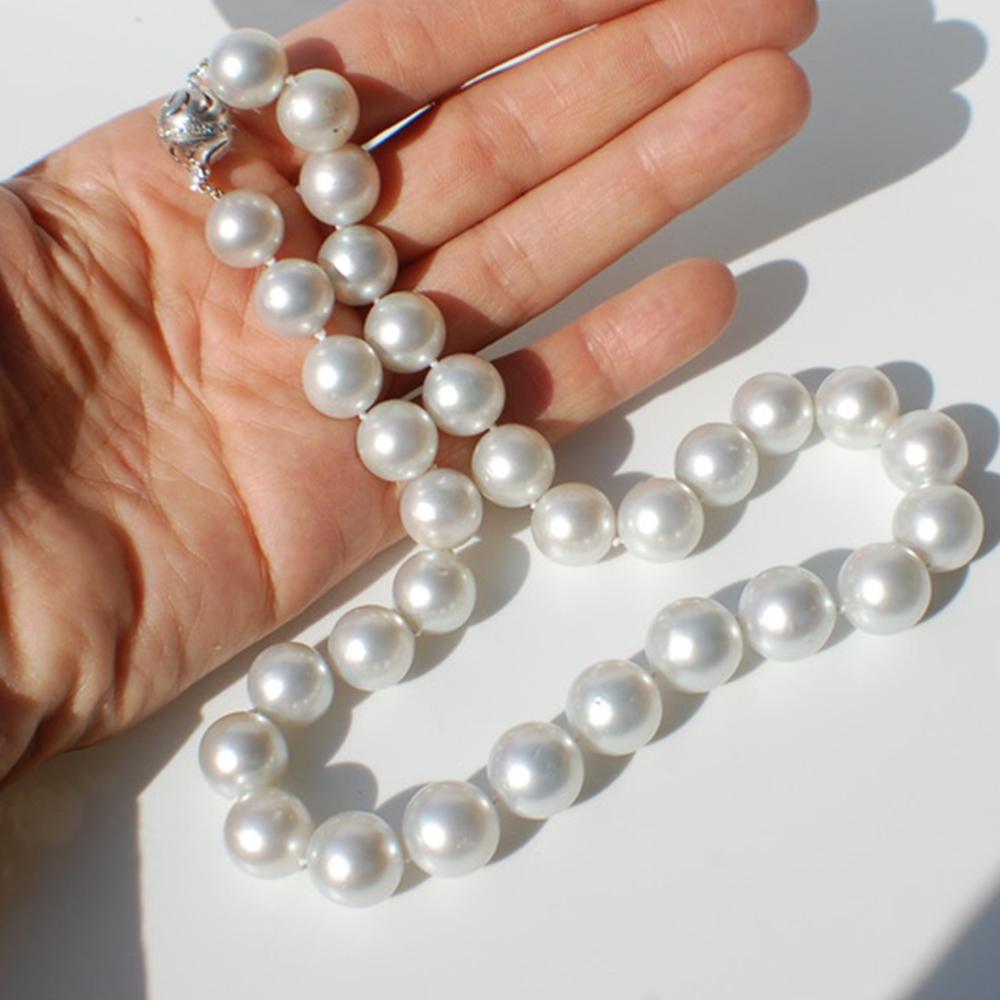 South Sea White Pearl Strand Necklace with Luminous Quality Natural Beads.
Length is 18 inches.

This amazing strand is so beautiful with a striking white color with gray undertones. T
he weight of this necklace is 104.70 grams.
The shine of these