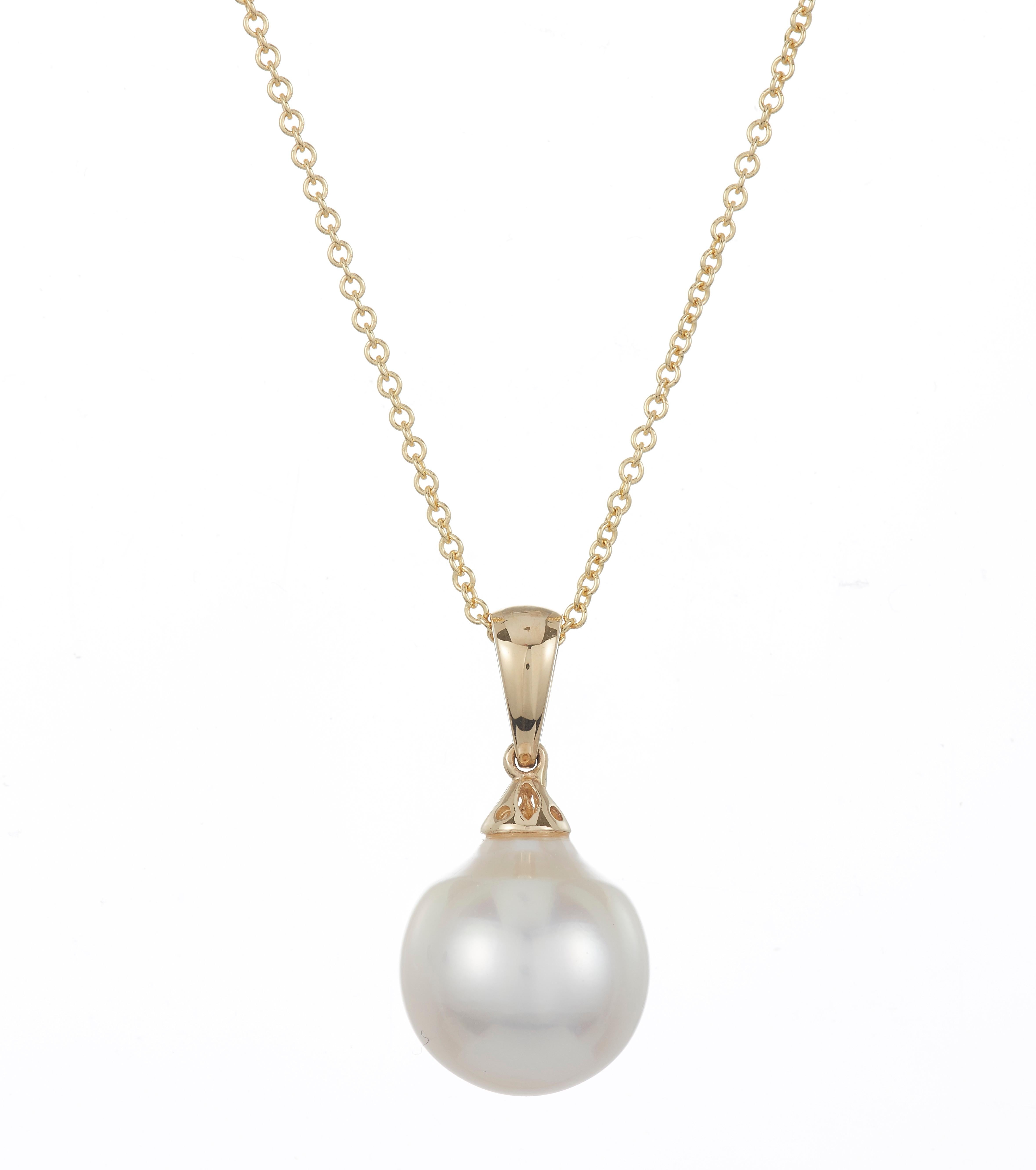 14K Yellow Gold
Stone Details: 1 Round Tahitian South Sea Pearl at 12.50 Millimeters
Diamond Details: 1 Brilliant Round White Diamond at 0.02 Carats - Clarity: SI / Color: H-I

Fine one-of-a-kind craftsmanship meets incredible quality in this