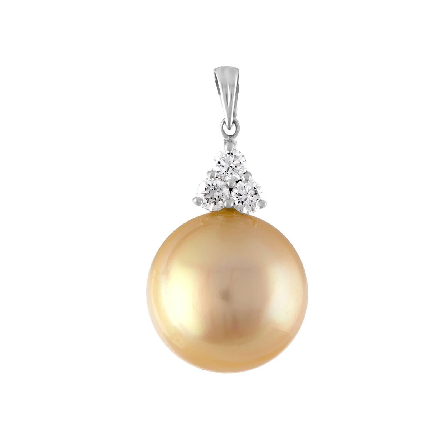 Very Unusual Gold Pearl Necklace
The necklace is 18K White Gold
There are 0.33 Carats  in Diamonds G SI
The South Sea Cultured Pearl is 14.00mm
The chain is 18K White Gold and is 16