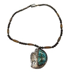 South Western Navajo Kokopelli Sterling Silver Necklace with Large Turquoise Stone (Collier en argent sterling Kokopelli du sud-ouest de Navajo avec une grande pierre turquoise)