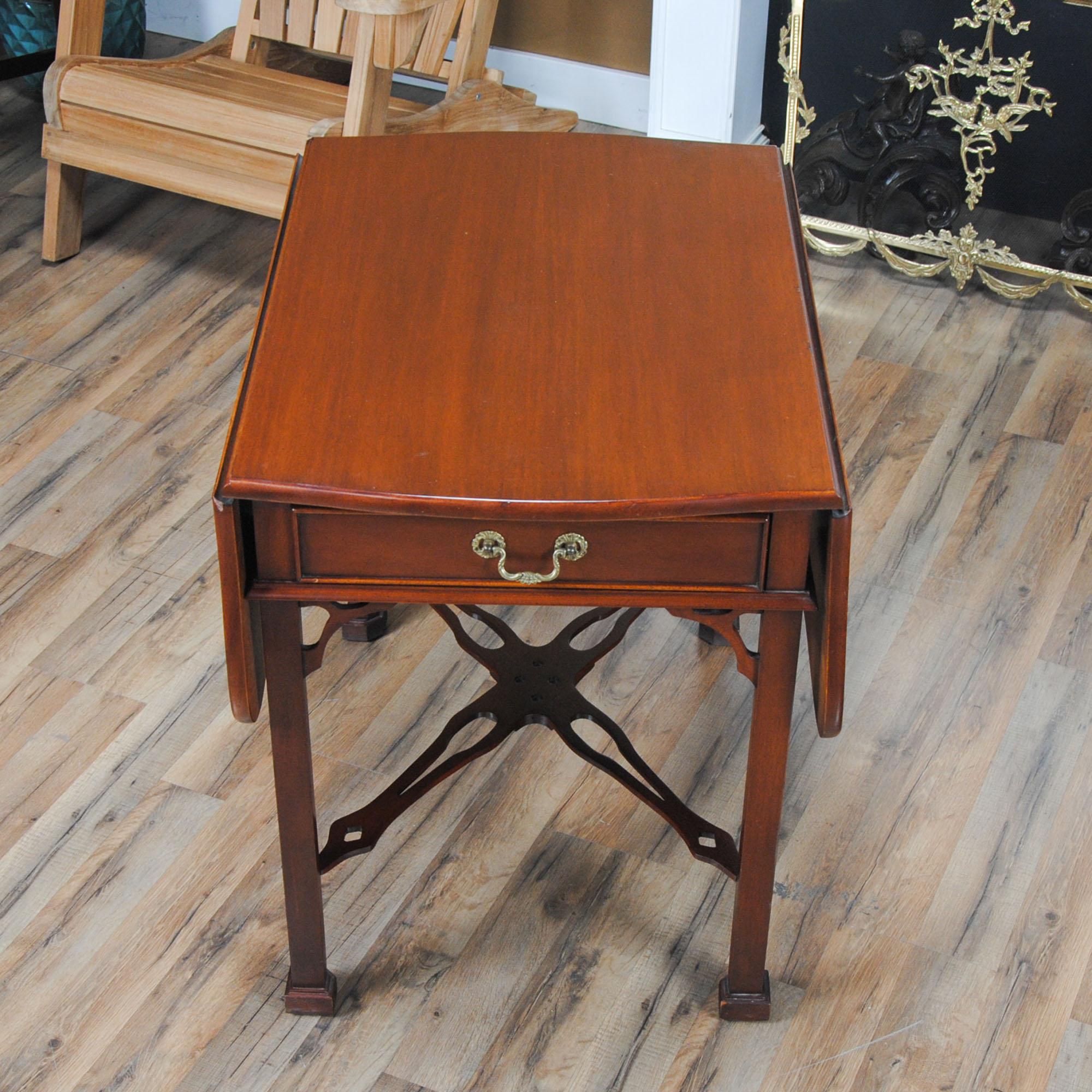 This beautiful Southampton Dropside Table will be recognizable to anyone familiar with fine antique furniture. Originally designed by Henry Herbert, 9th Earl of Pembroke, this form of table was made popular by various furniture designers in 18th