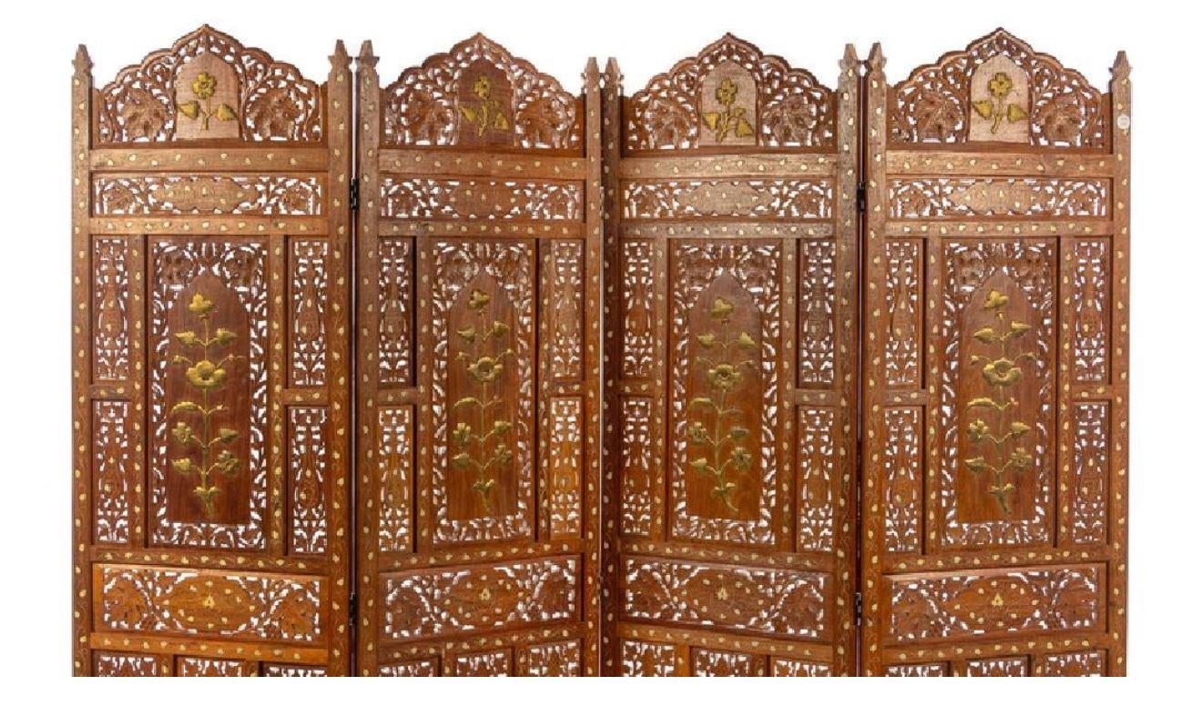 20th century Southeast Asian four panel floor screen with intricate carvings and inlay design. Each panel is adorned with raised floral gilt design.