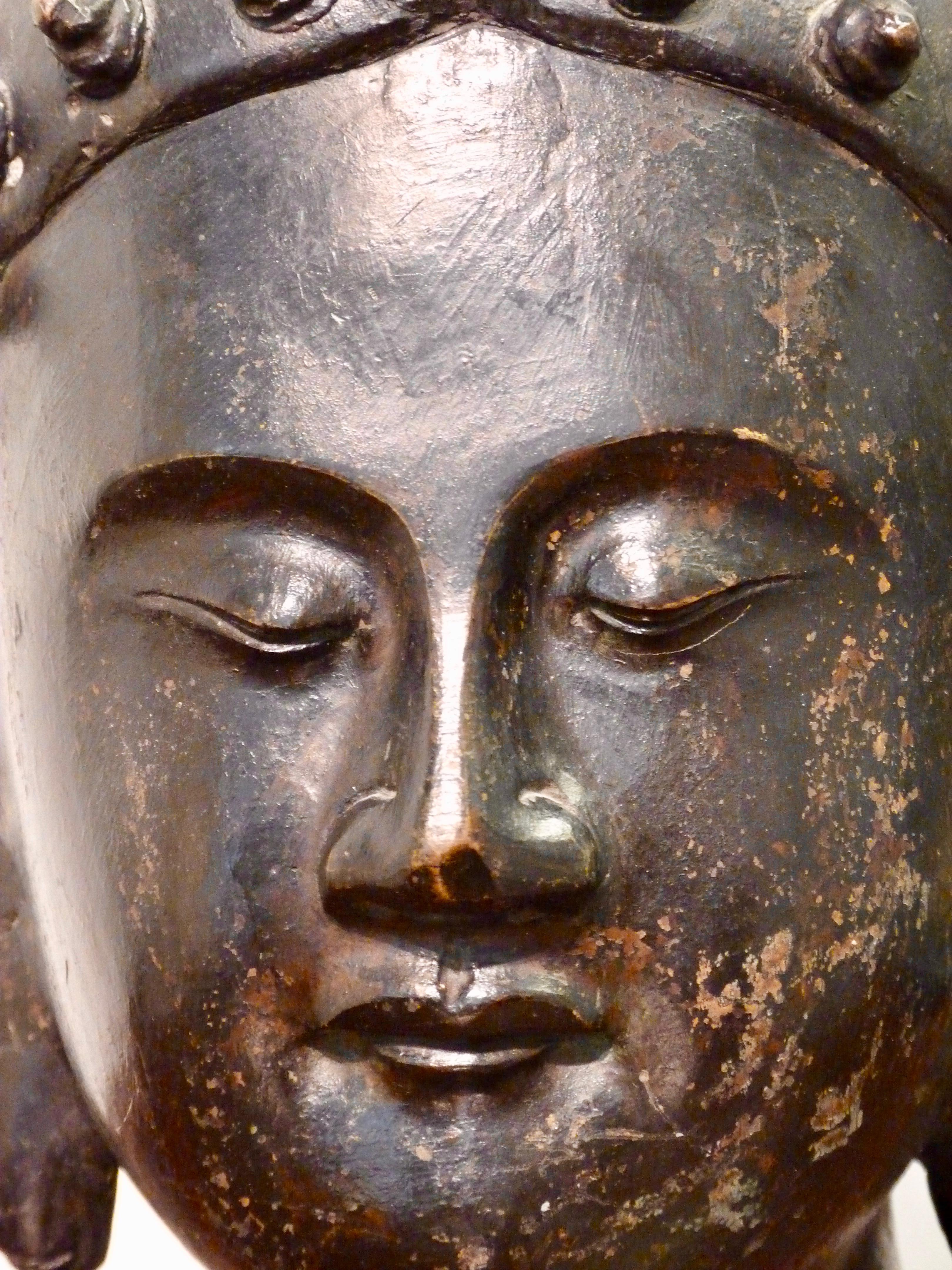 Southeast Asian style sculpture of a Buddha.