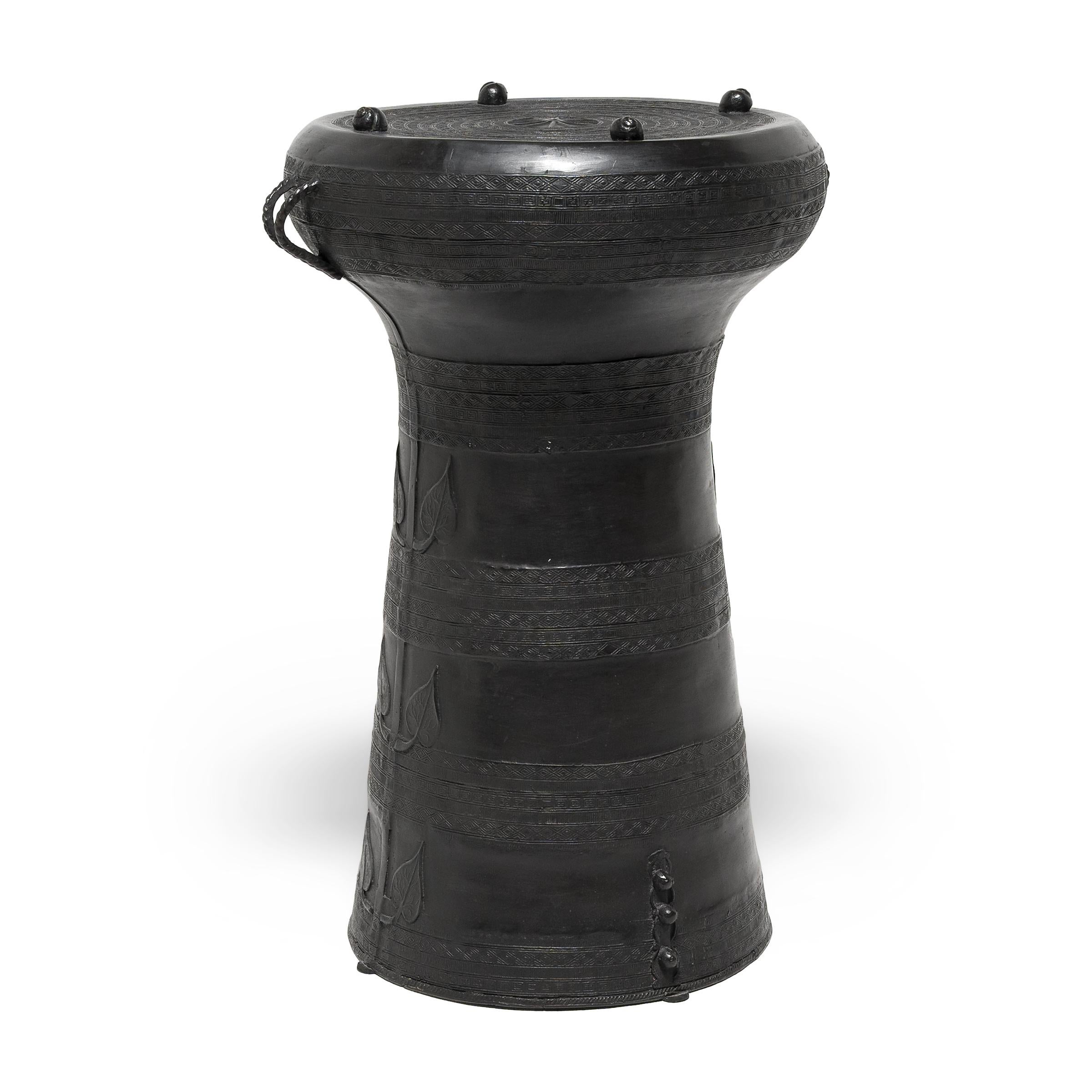 Based on forms created by the Dong Son culture of Vietnam as early as 600 BCE, this cast bronze rain drum continues tradition with beautiful precision. Created by artisans of the Karen culture of Burma and northern Thailand, bronze rain drums were