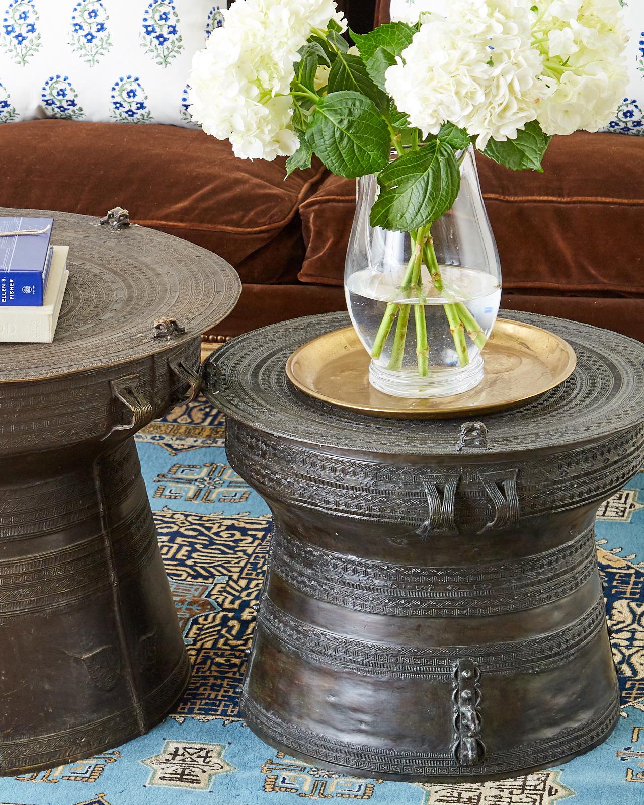 Rare, Southeast Asian bronze rain drum table or frug drum that could serve as a drinks table or coffee table. Bronze drum with a cylindrical waisted form typically from Eastern Burma or Myanmar by the tribes of Karen people. Used in some Asian