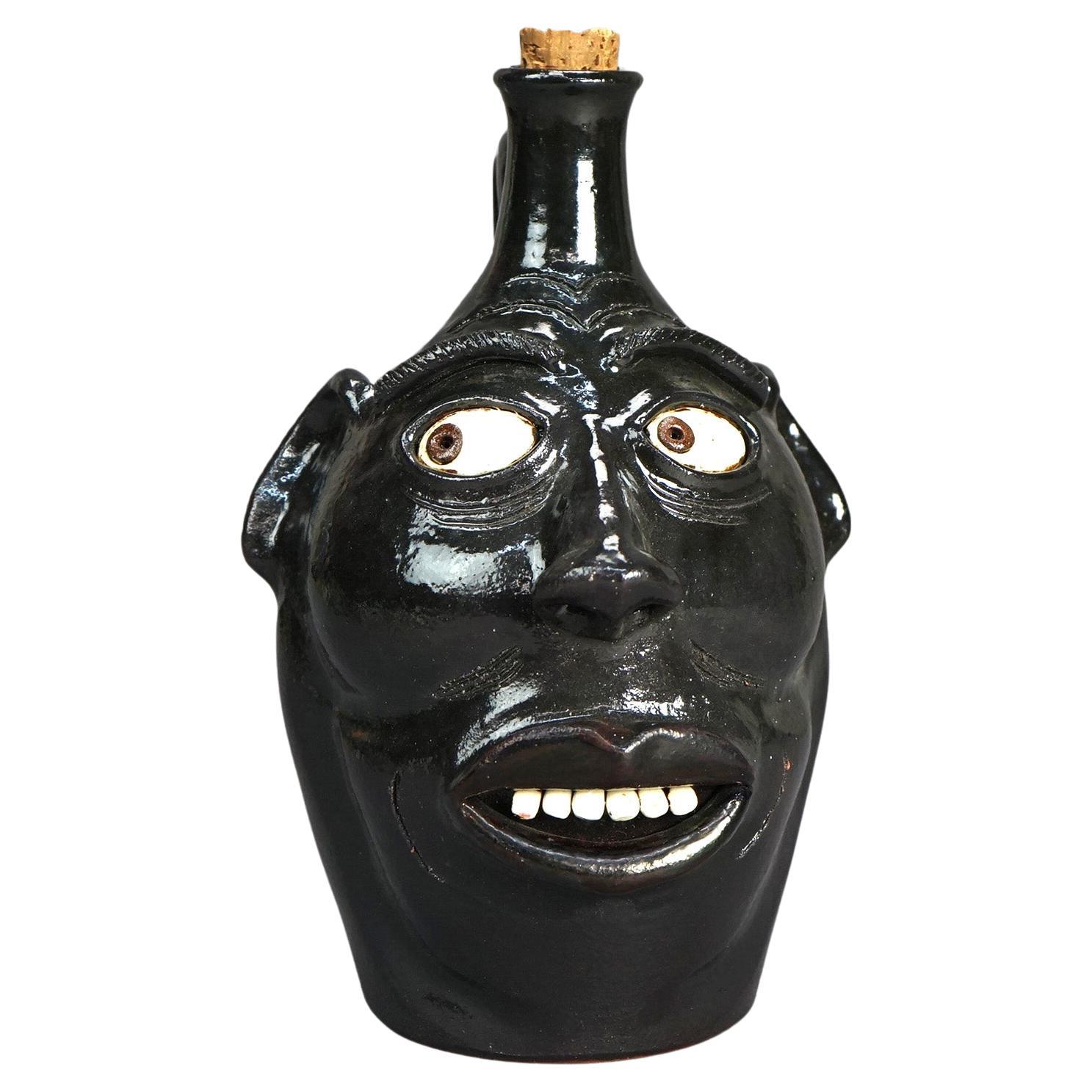 Southern Americana Pottery Face Jug by Perdua 20thC For Sale