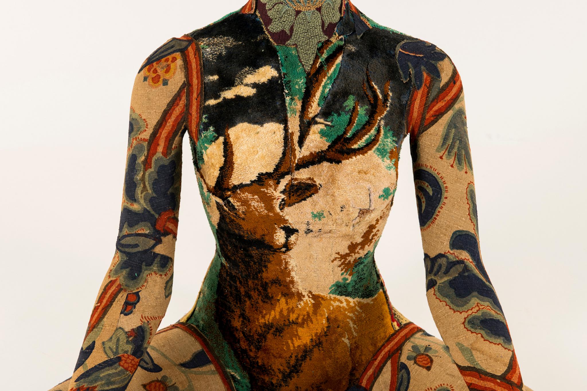 Southern Beasts Namaste Dear: her face is adorned with a vintage tapestry textile: bodice is from a velvet deer throw rug; arms and legs of antique printed French linen with birds, flora and fauna.

Mary Lou Marks is mother hen and artist to