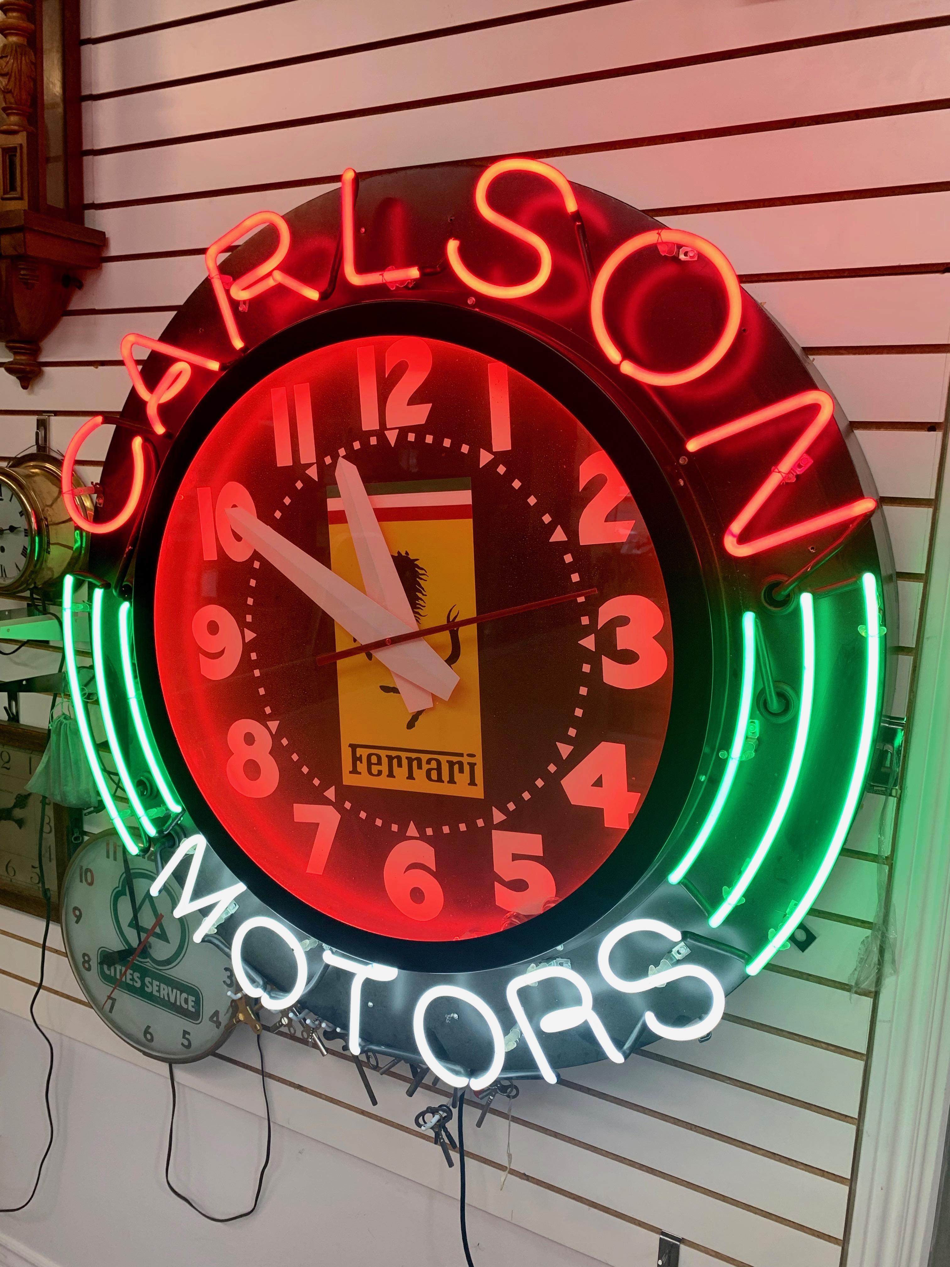 Large neon clock from a Southern California Ferrari dealership. Great colors, excellent condition. Clock has been serviced and is in excellent working order. Great Ferrari advertising piece. Just over 3 feet in diameter.