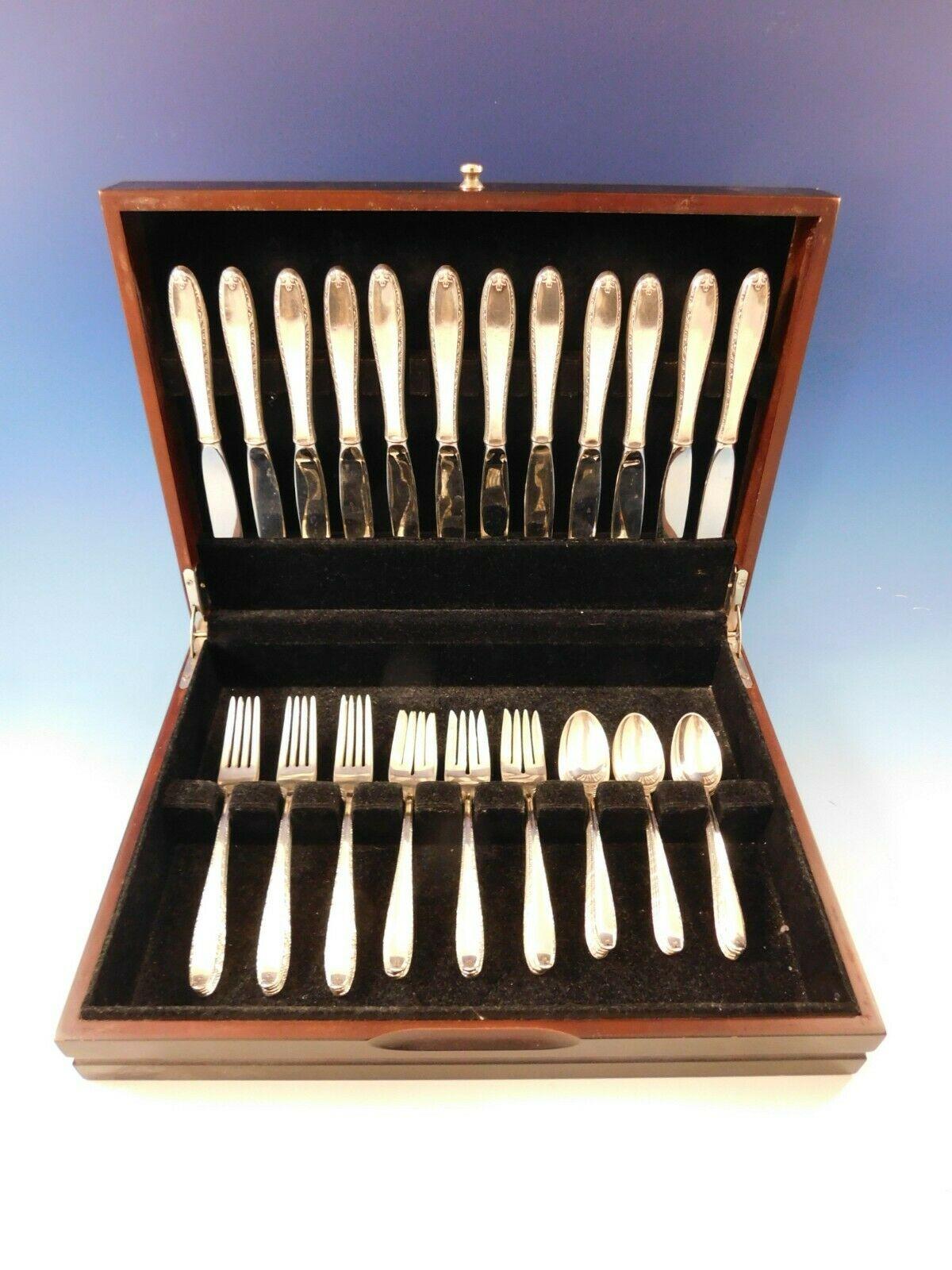 Southern Charm by Alvin sterling silver Flatware set, 48 pieces. This set includes:

 12 Knives, 9