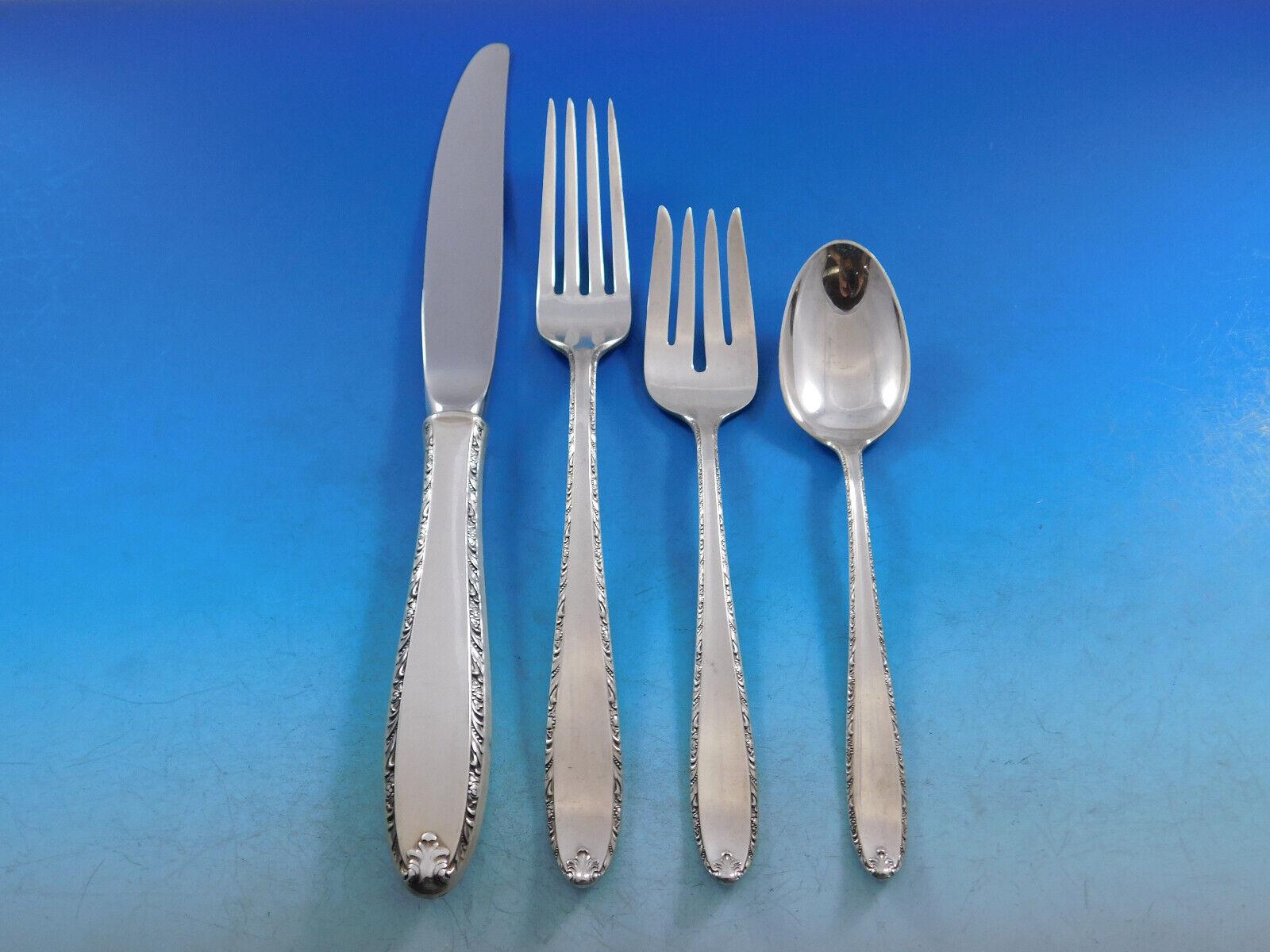 Dinner Size Southern Charm by Alvin c1947 sterling silver Flatware set, 63 pieces. This set includes:

12 Dinner Size Knives, 9 5/8