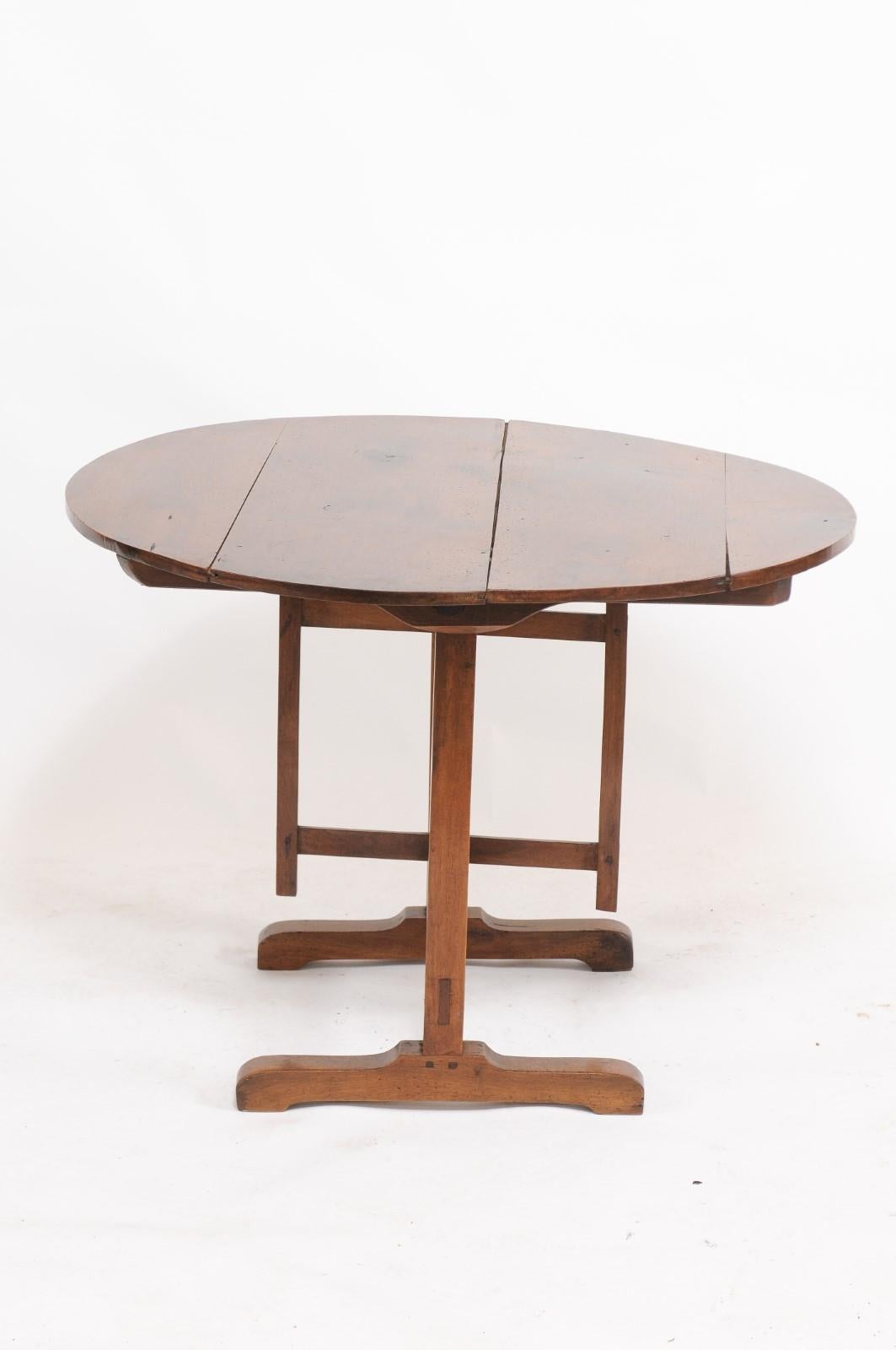 Rustic Southern French 1910s Solid Walnut Wine Tasting Table with Circular Tilt-Top