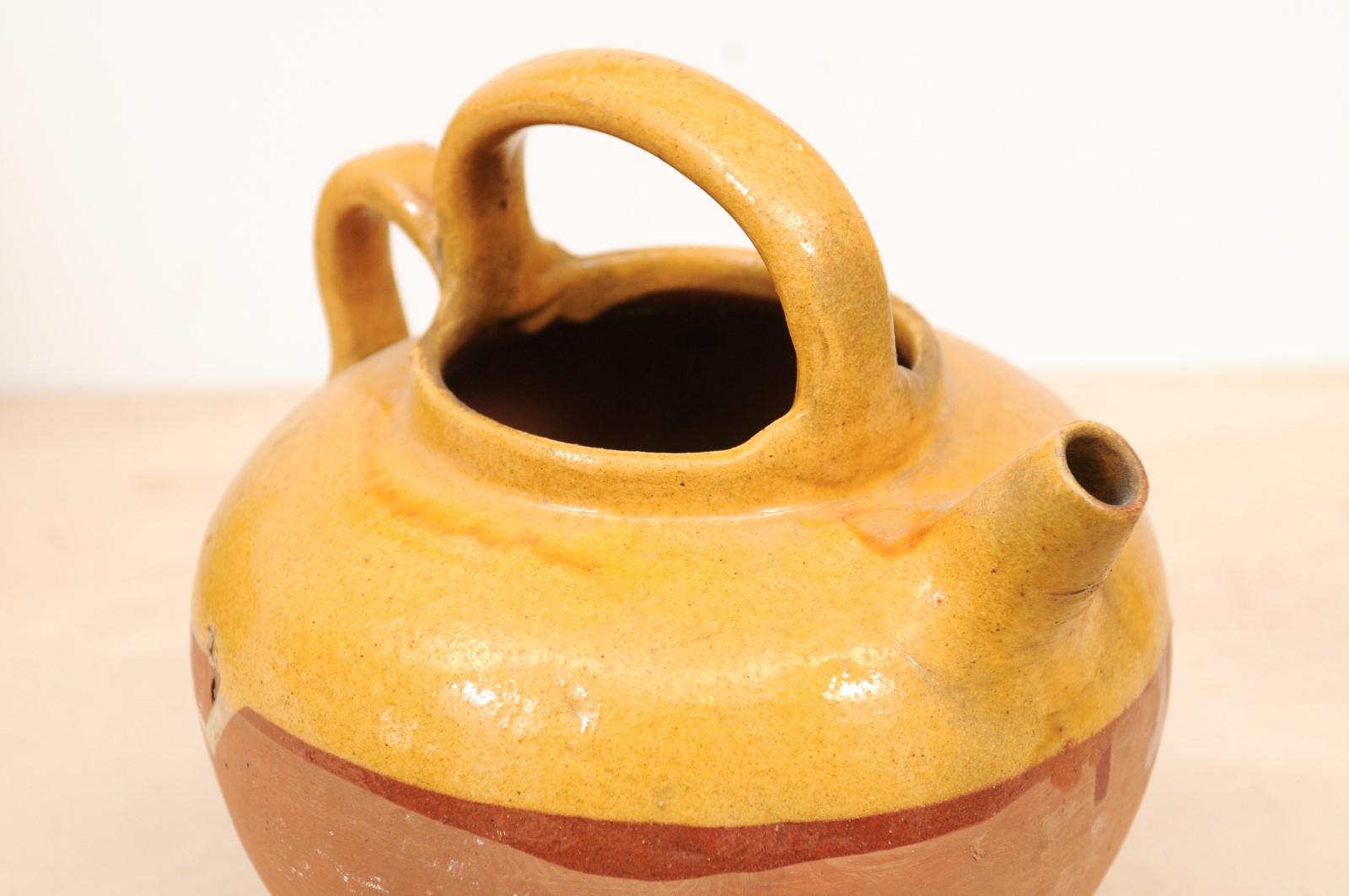 Glazed Southern French 19th Century Olive Oil Pot with Yellow Glaze and Two Handles