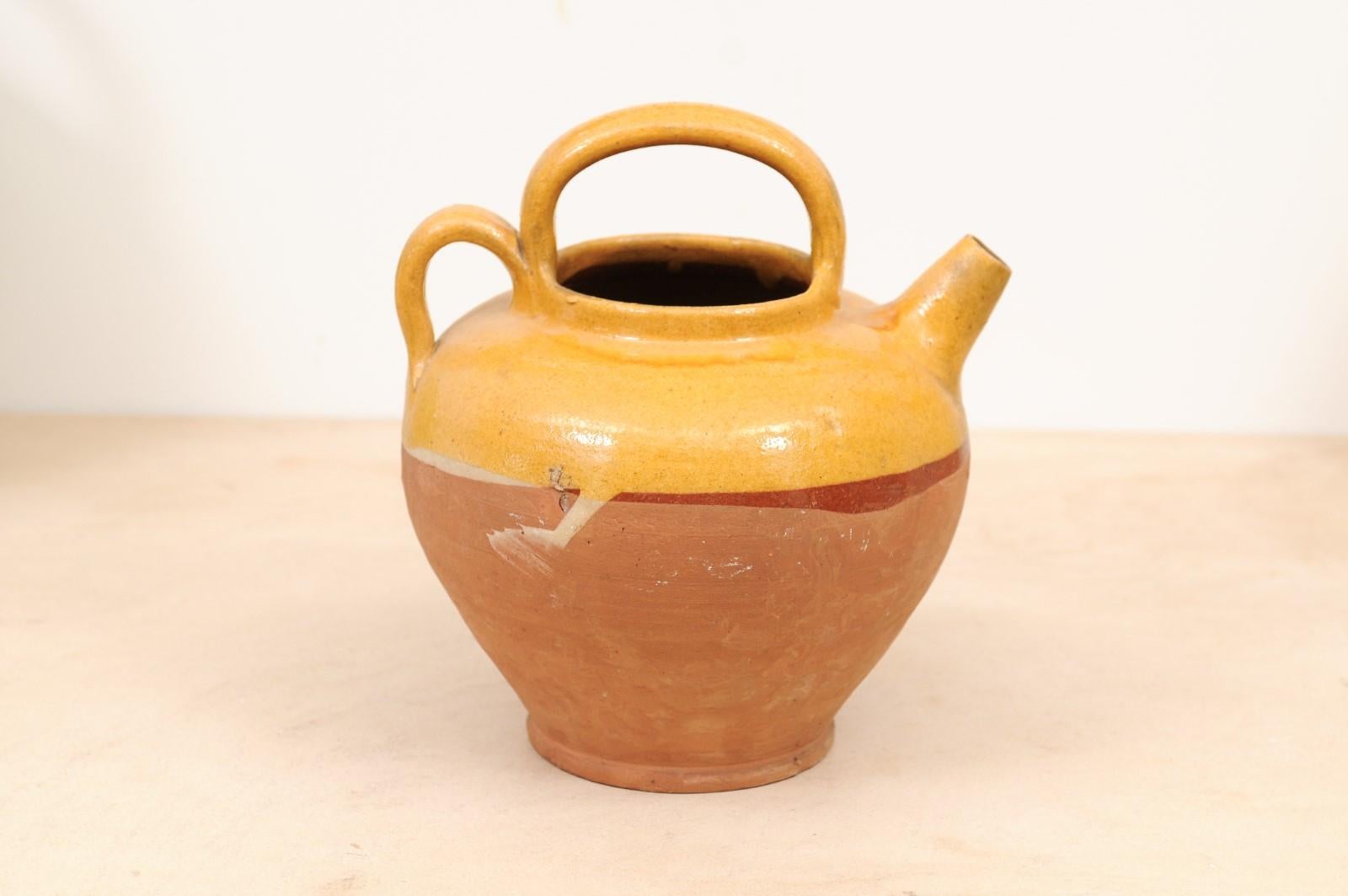 Terracotta Southern French 19th Century Olive Oil Pot with Yellow Glaze and Two Handles