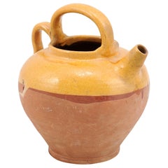 Southern French 19th Century Olive Oil Pot with Yellow Glaze and Two Handles