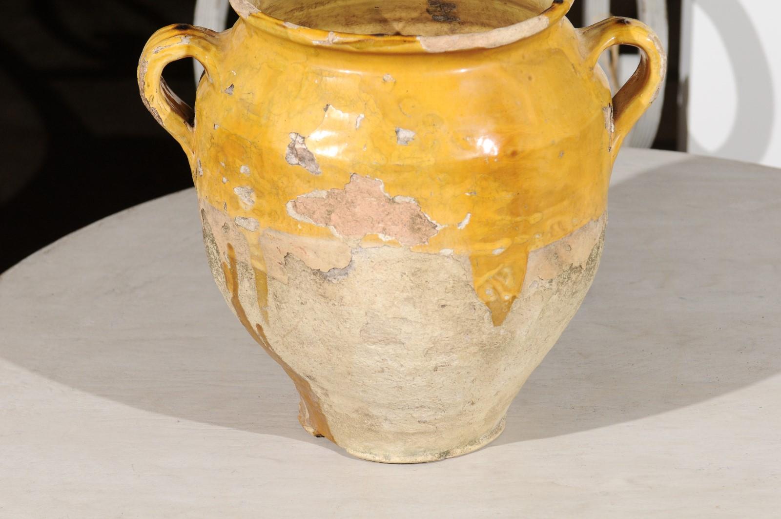 19th Century Southern French Yellow Glazed Terracotta Confit Pot with Two Handles, circa 1850