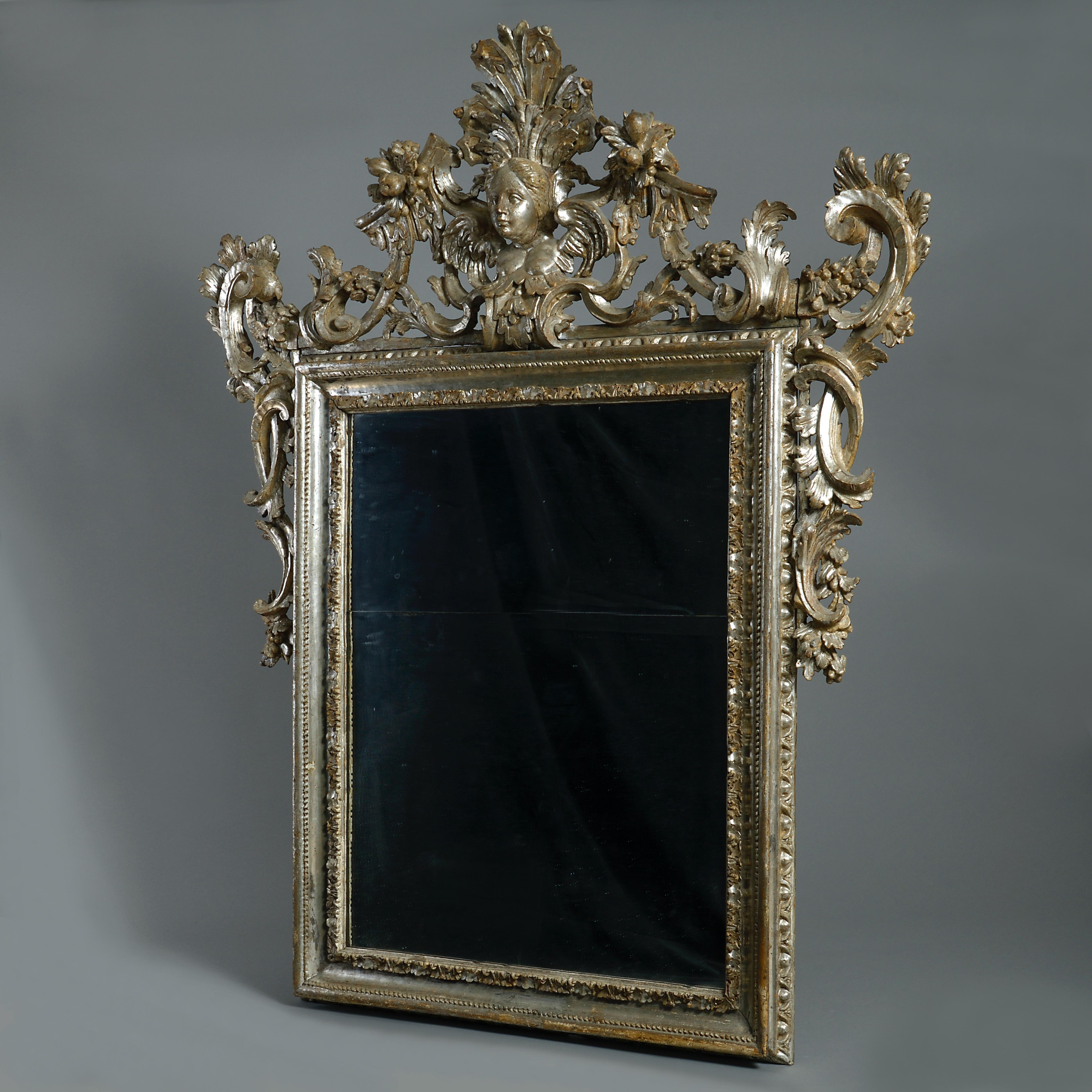 A fine southern Italian silvered wood mirror, Naples or Sicily, circa 1730.