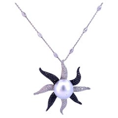 Colgante de perla de Southsea con diamante en oro blanco de 18 quilates