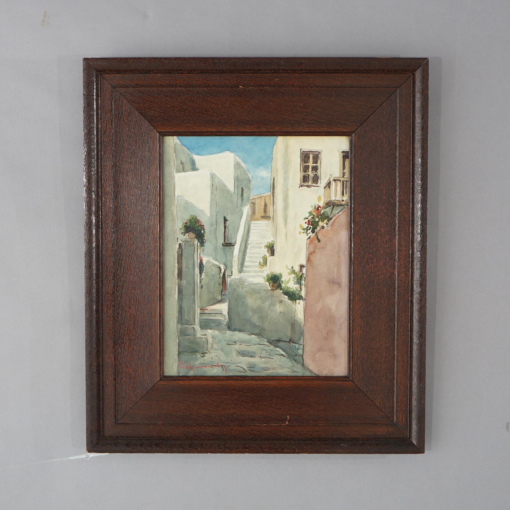 An antique painting in the manner of Taos School offers watercolor on paper street scene, artist signed lower right, seated in Arts and Crafts Mission oak frame, c1910 

Measures - 20.75
