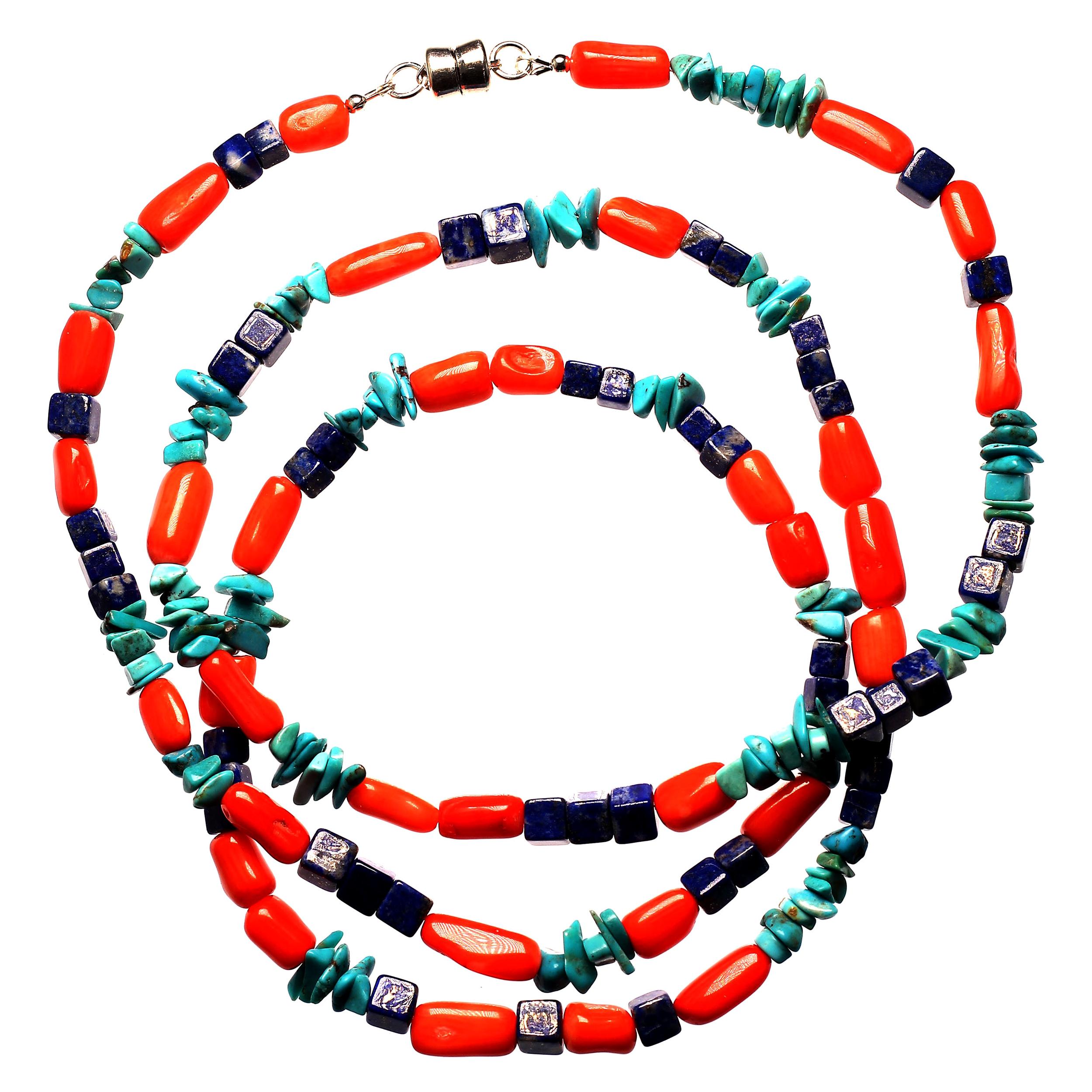 This is a great, colorful, lightweight necklace at 35 inches that can be worn long or doubled. It features tubes of bright bamboo Coral, squares of Lapis Lazuli, and chips of Turquoise.  All these are highly polished and randomly arranged.  This