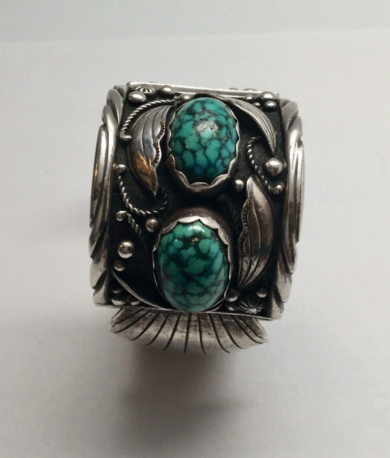 Southwestern Les Baker Shop sterling silver turquoise watch cuff.

Marked:  LB with stamped eagle in between, Sterling.

Measures: 6